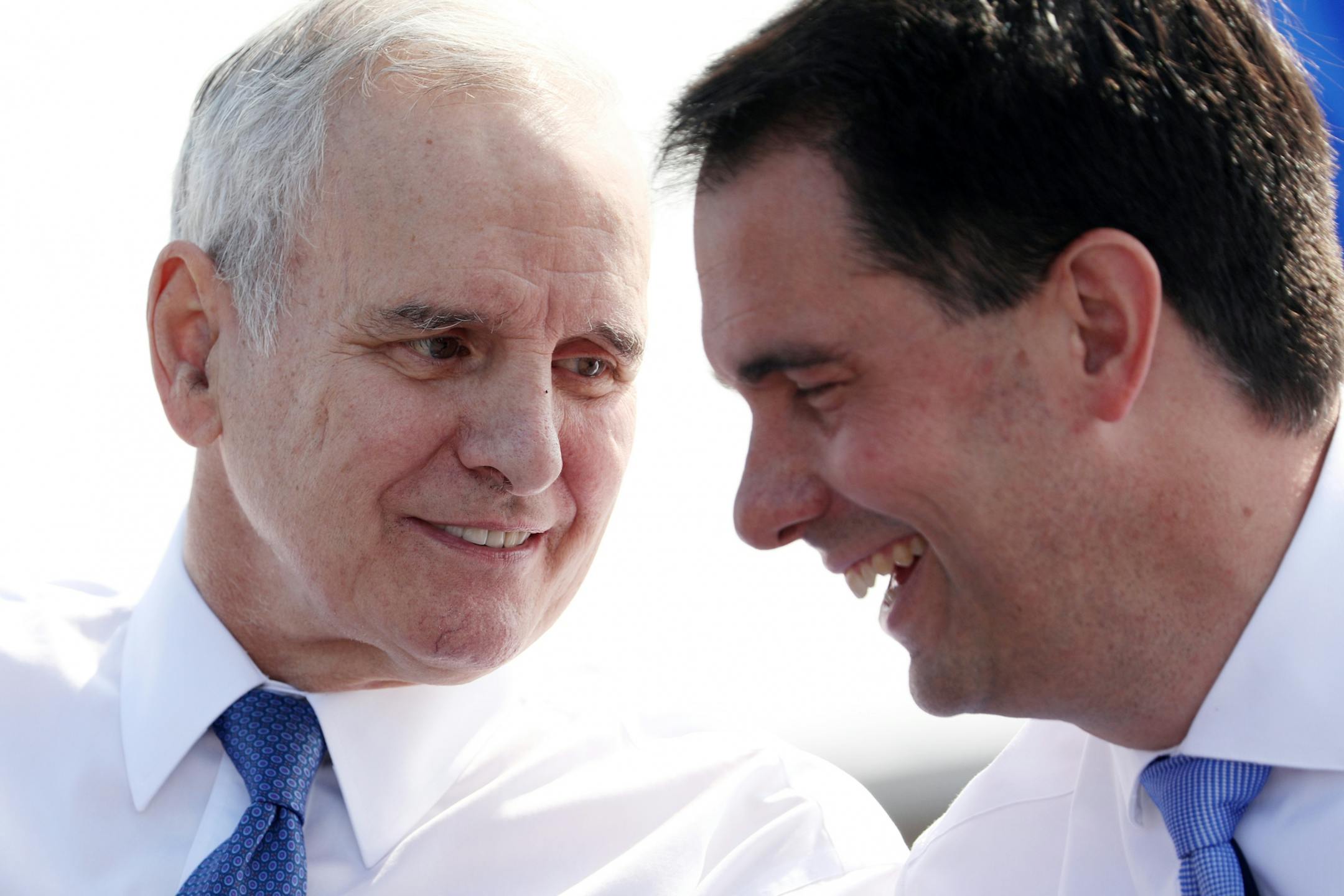 Minnesota Gov. Mark Mark Dayton talked with Wisconsin Gov. Scott Walker during the ribbon-cutting ceremony.
