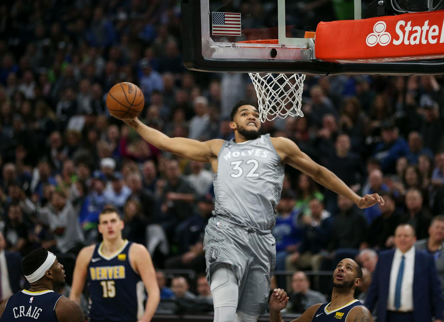 Timberwolves center Karl-Anthony Towns prepared to dunk in the first half.