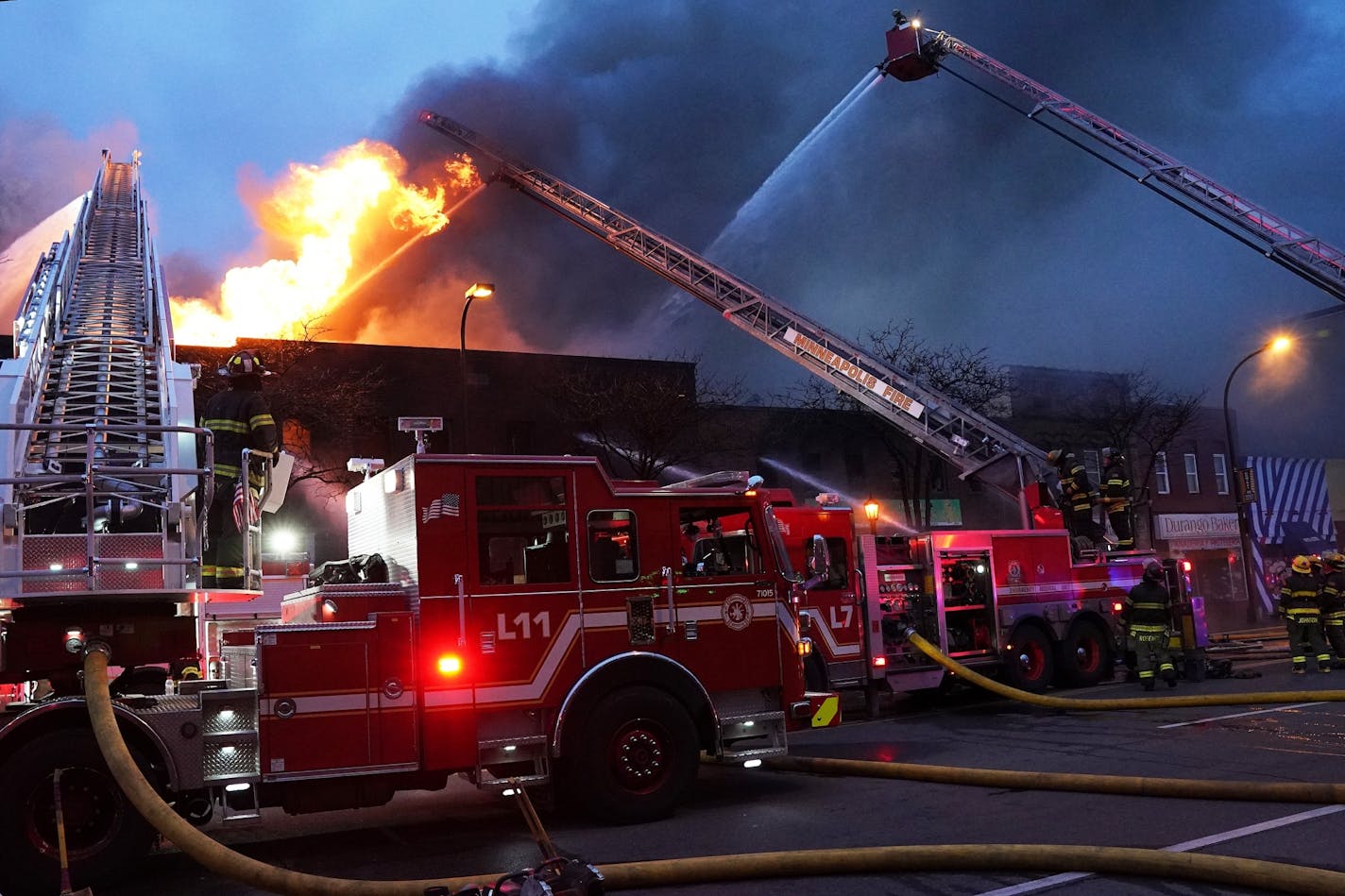 Minneapolis firefighters battled a fire in the 2400 block of Central Avenue on Sunday, March 22, 2020, in northeast Minneapolis.