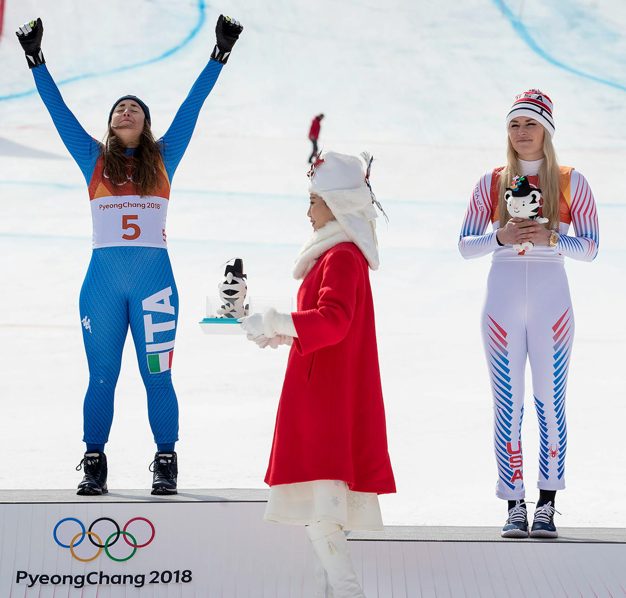 Sofia Goggia of Italy celebrated during the Venue Ceremony at Jeongseon Alpine Centre after winning the Gold Medal in the Women's Downhill. Lindsey Vonn (right) of the USA won the bronze medal.