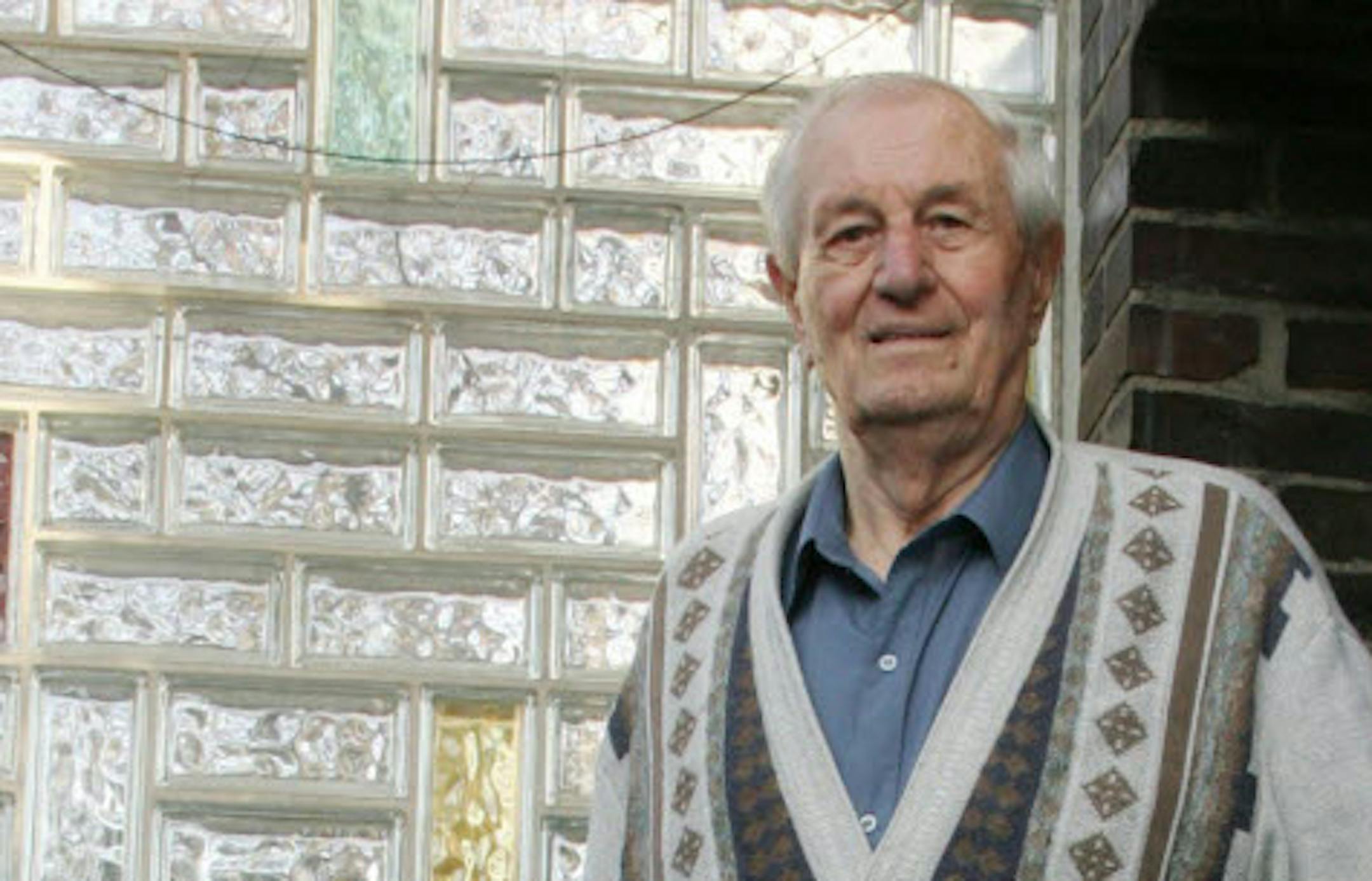 FILE - In this March 10, 2005 file photo Hitler's bodyguard Rochus Misch poses at his home in Berlin, Germany.