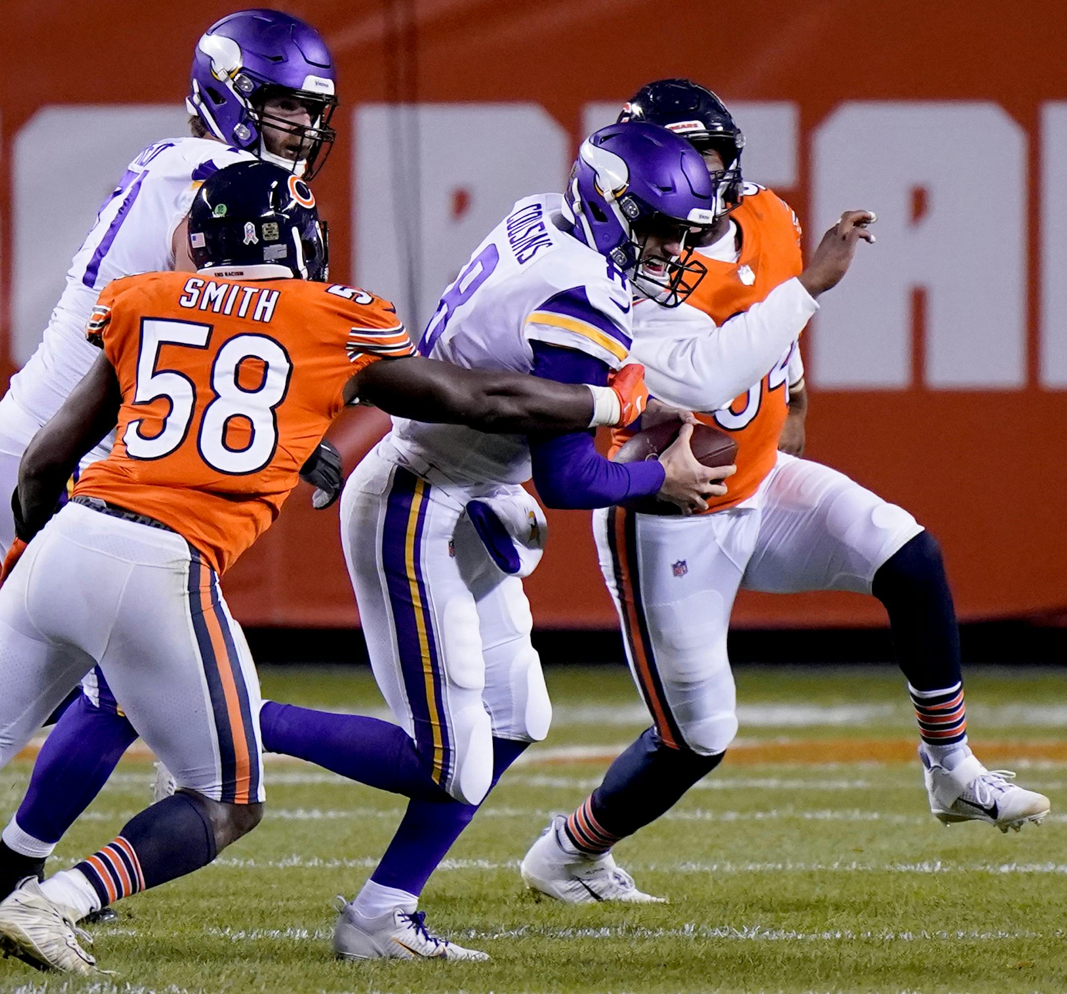 Chicago Bears linebacker Roquan Smith (58) sacks Minnesota Vikings quarterback Kirk Cousins during the second half of an NFL football game Monday, Nov. 16, 2020, in Chicago. (AP Photo/Nam Y. Huh)
