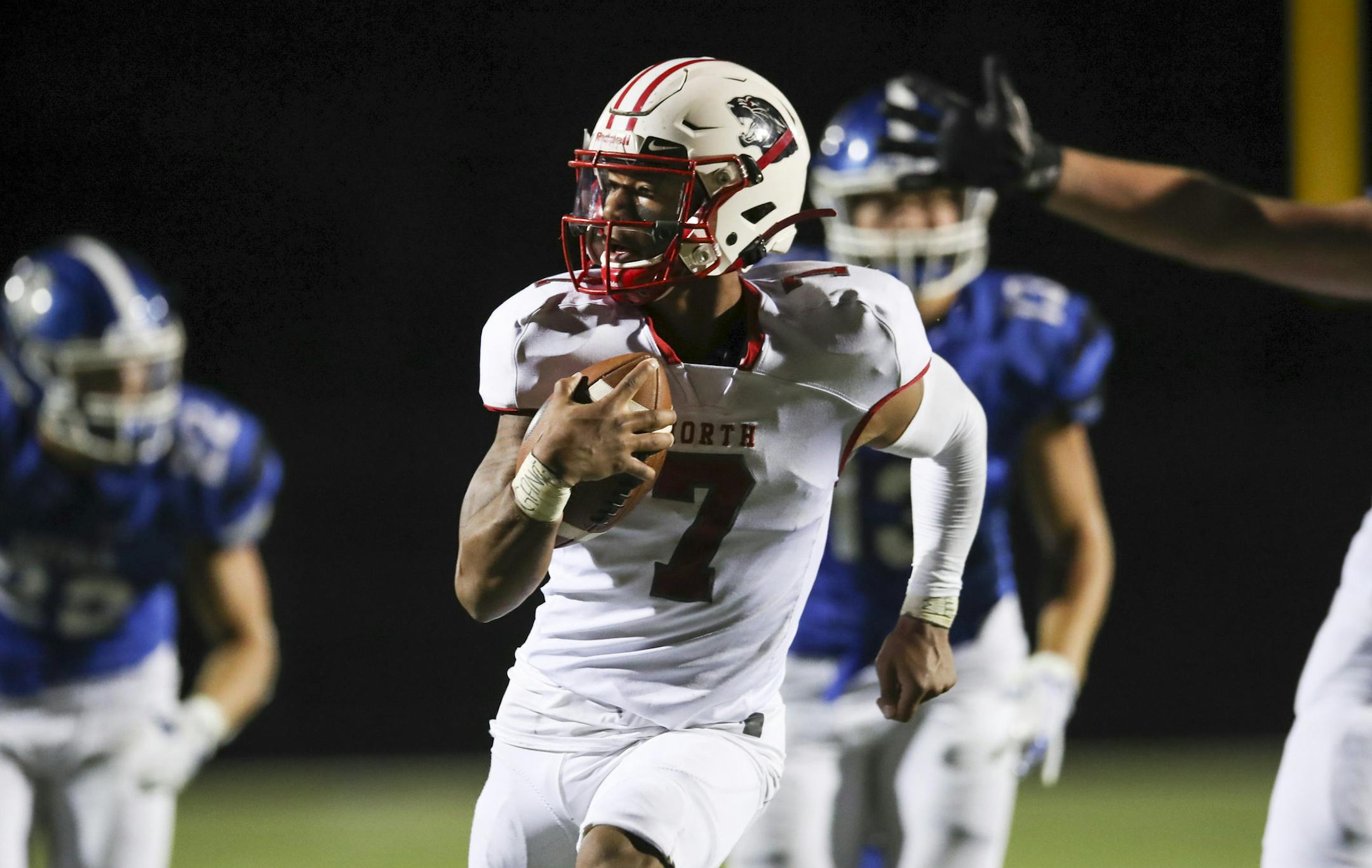 Lakeville North quarterback RaJa Nelson scored on a 44 yard keeper in the third quarter. ] JEFF WHEELER • jeff.wheeler@startribune.com Defending state champions Lakeville North defeated Woodbury High School 24-7 in a high school football game at Woodbury Thursday night, August 29, 2019.