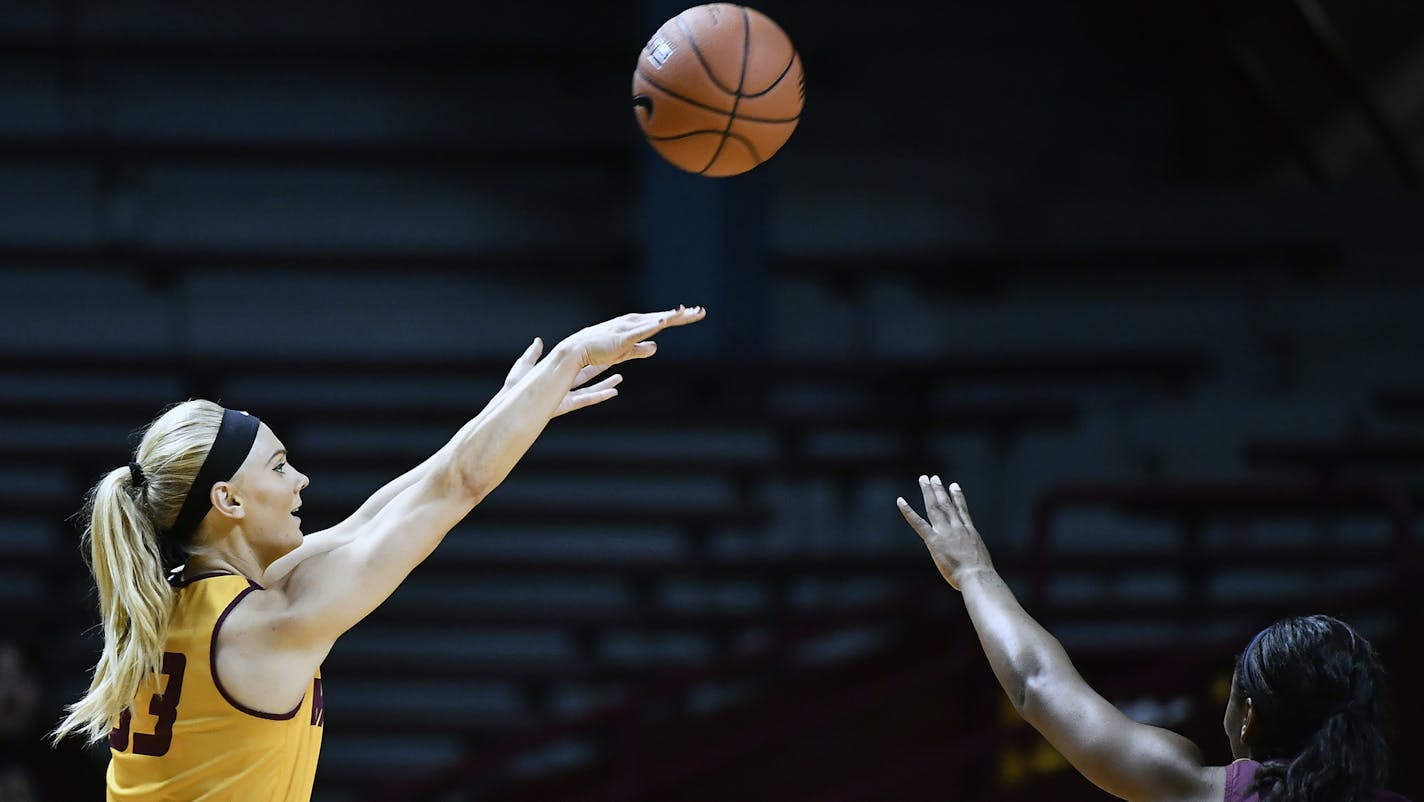 Gophers junior guard Carlie Wagner (33) attempted a 3-point shot during Saturday's scrimmage at Williams Arena. ] (AARON LAVINSKY/STAR TRIBUNE) aaron.lavinsky@startribune.com The University of Minnesota Golden Gophers women's basketball team scrimmaged on Saturday, Oct. 22, 2016 at Williams Arena in Minneapolis, Minn.