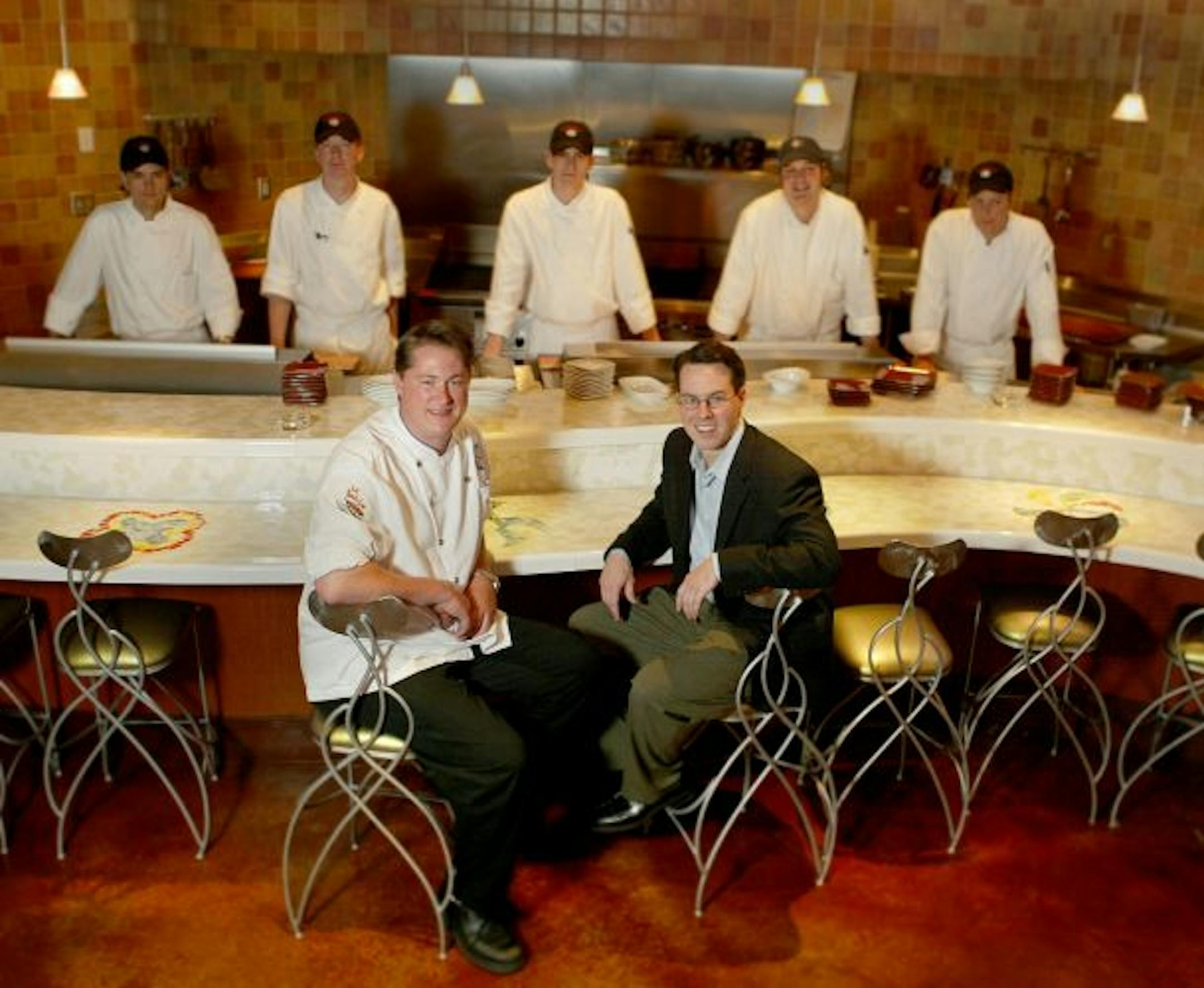 Restaurant owners Tim McKee and Josh Thoma, in happier times, when they opened Solera in Minneapolis' theater district in 2003. Starting Monday, the Spanish-style restaurant and events center will be managed by Graves Hospitality Corp.
