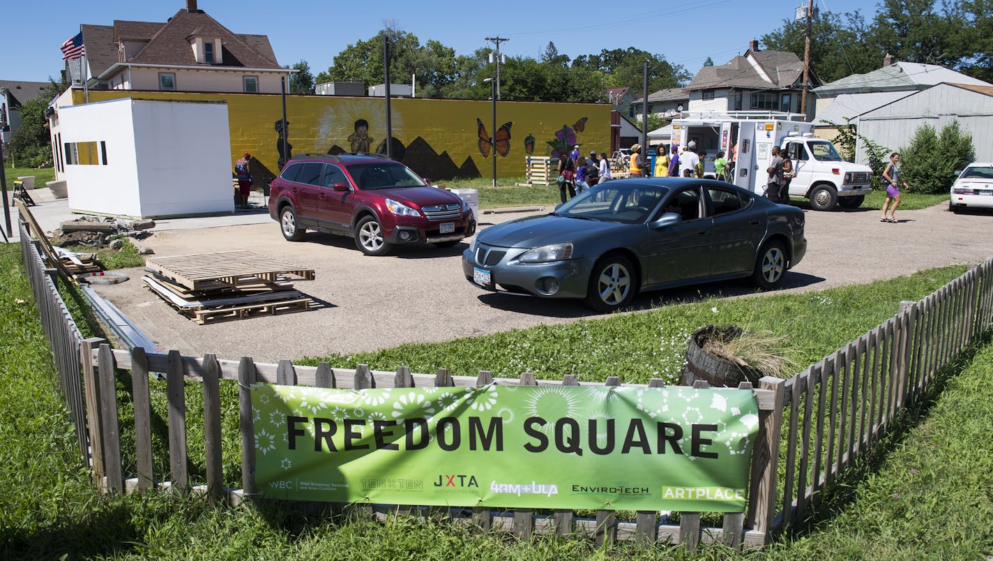 The Freedom Square dedication took place along West Broadway Avenue on Friday. ] Isaac Hale &#x2022; isaac.hale@startribune.com Freedom Square was dedicated at the intersection of West Broadway Avenue and Logan Avenue North in Minneapolis, MN, on Friday, July 29, 2016. In addition to the new public plaza, benches and bike racks were also implemented along West Broadway Avenue. The dedication was a part of the Flow Northside Arts Crawl, taking place from Thursday through Saturday.