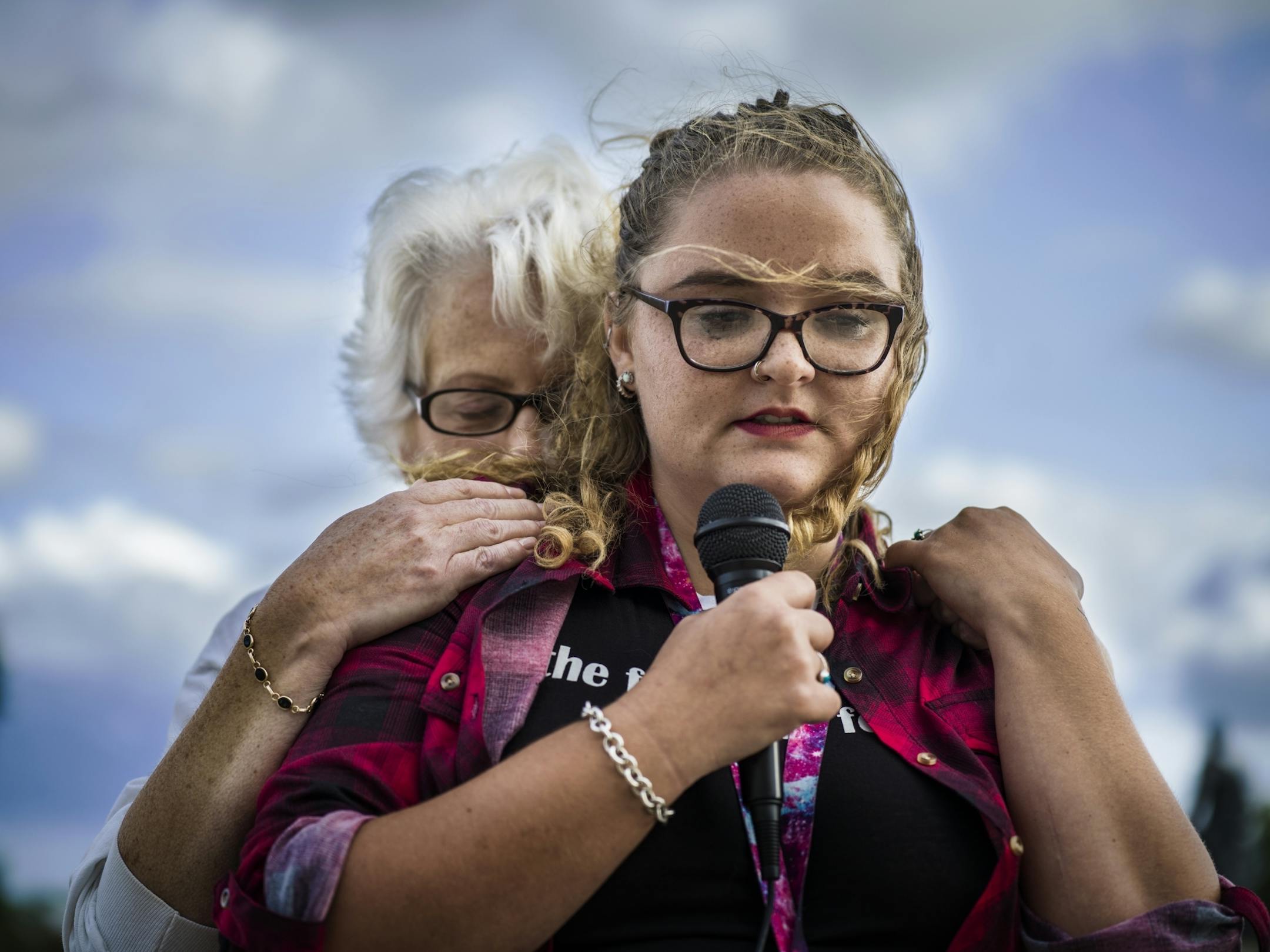 Erin Nanasi, a sexual assault survivor from the Children's Theatre comforted Sarah Kaleigh Seifert,21, who spoke of her rape by an acquaintance.