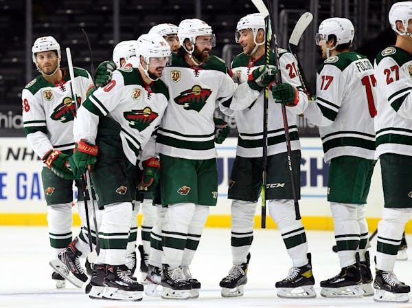 Wild sticks with same script, tops Kings in OT for second straight game