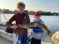 Will Sayer of Excelsior and Colin Irwin of Boston showed a 30-inch northern pike they caught on Lake Minnetonka. Will and Colin are cousins.