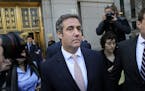 FILE - In this April 26, 2018 file photo, Michael Cohen leaves federal court in New York.