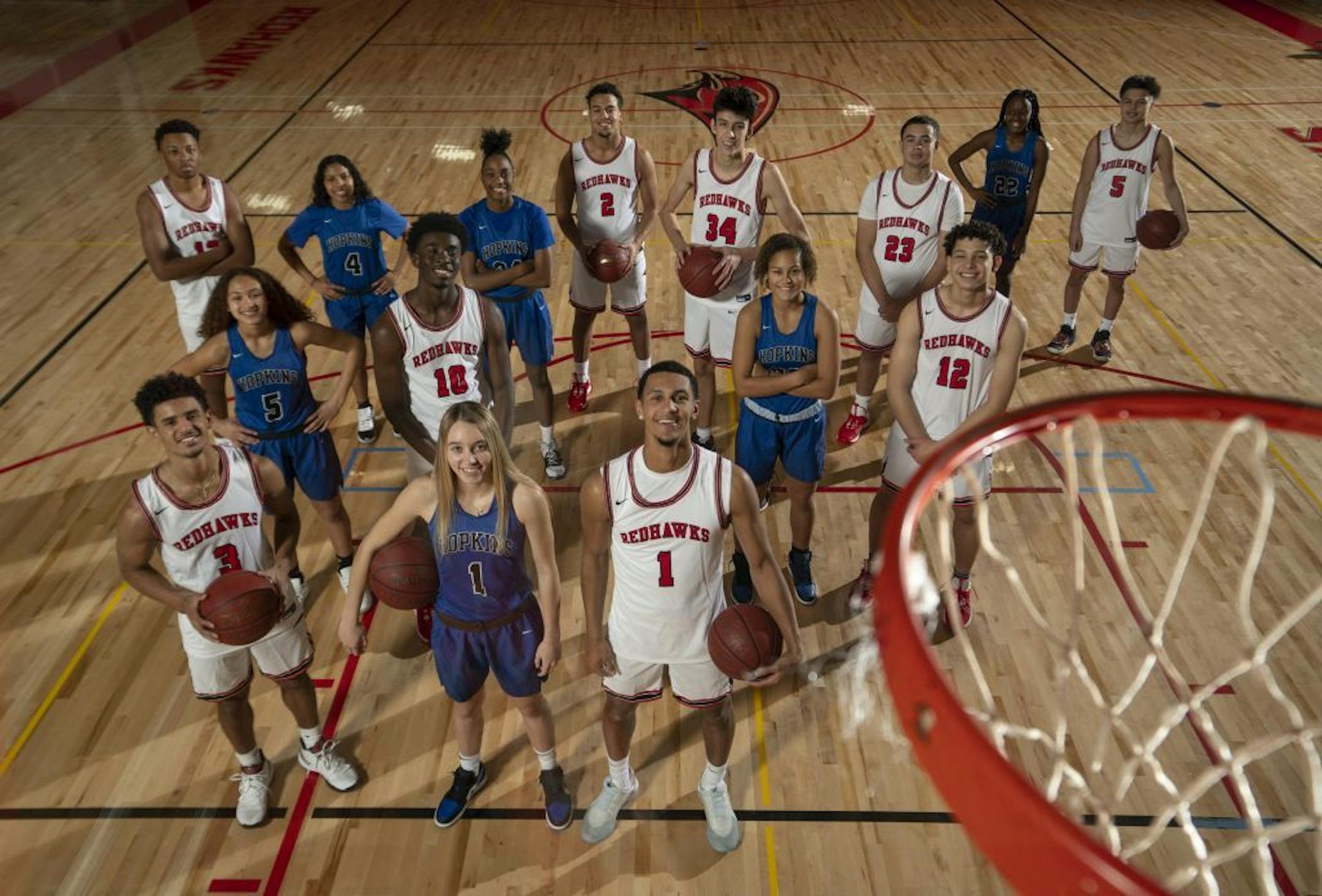 Paige Bueckers and Jalen Suggs, front and center and both wearing No. 1, are joined by some of their Minnehaha Academy and Hopkins teammates.