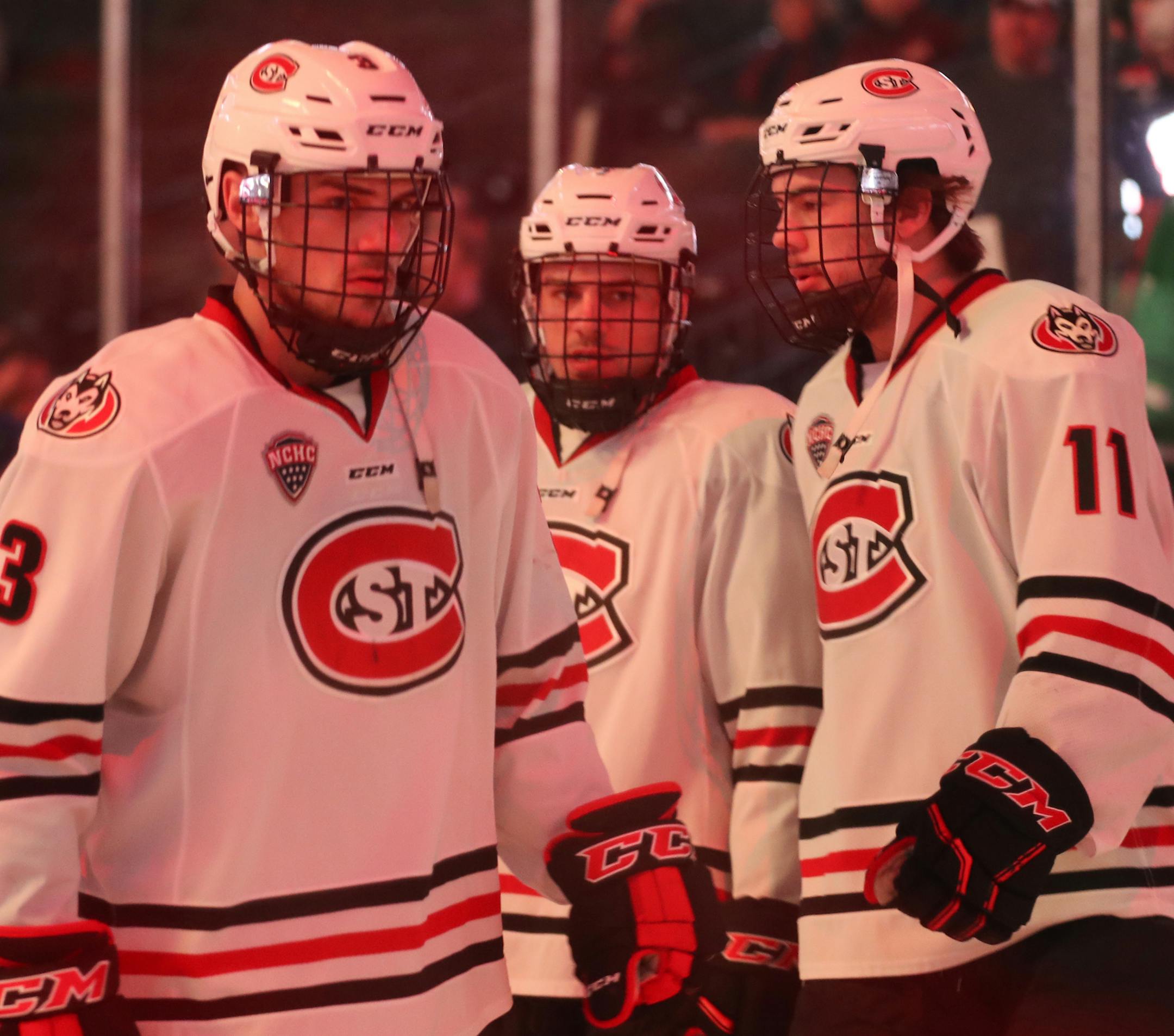 Brothers Jack (3), Nick (center) and Ryan (11) Poehling were together before lineups were announced at the SCSU game against Colorado College in the 2019 NCHC Tournament at Xcel Energy Center on Friday, March 22 in St. Paul, Minn. Ryan left the game in the first period after getting injured. ] Shari L. Gross ¥ shari.gross@startribune.com St. Cloud State University faced off against Colorado College in the 2019 NCHC Tournament at Xcel Energy Center on Friday, March 22 in St. Paul, Minn. Univ
