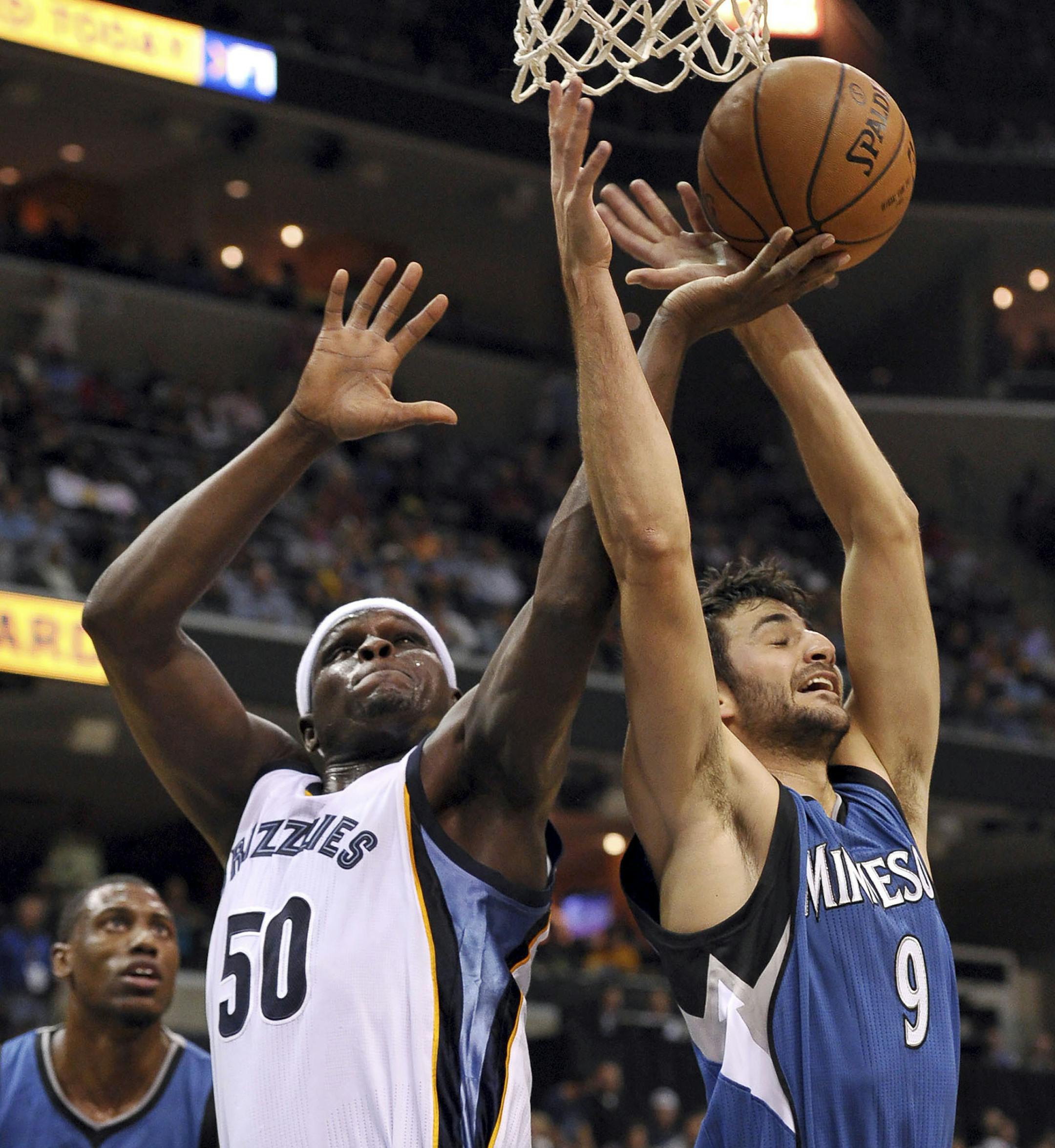 Memphis Grizzlies forward Zach Randolph (50) shoots against Minnesota Timberwolves guard Ricky Rubio (9) in the first half of an NBA basketball game Wednesday, Oct. 29, 2014, in Memphis, Tenn. (AP Photo/Brandon Dill)