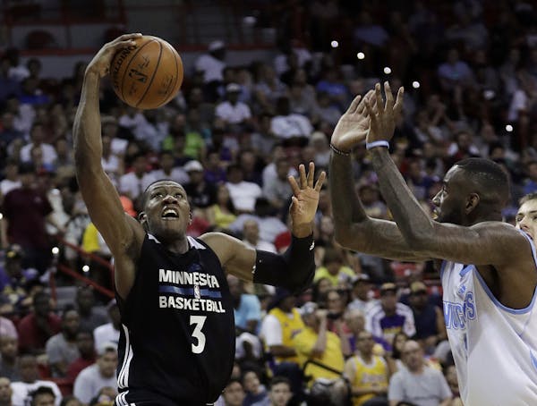 Minnesota Timberwolves' Kris Dunn missed Monday's NBA Summer League game with a concussion.