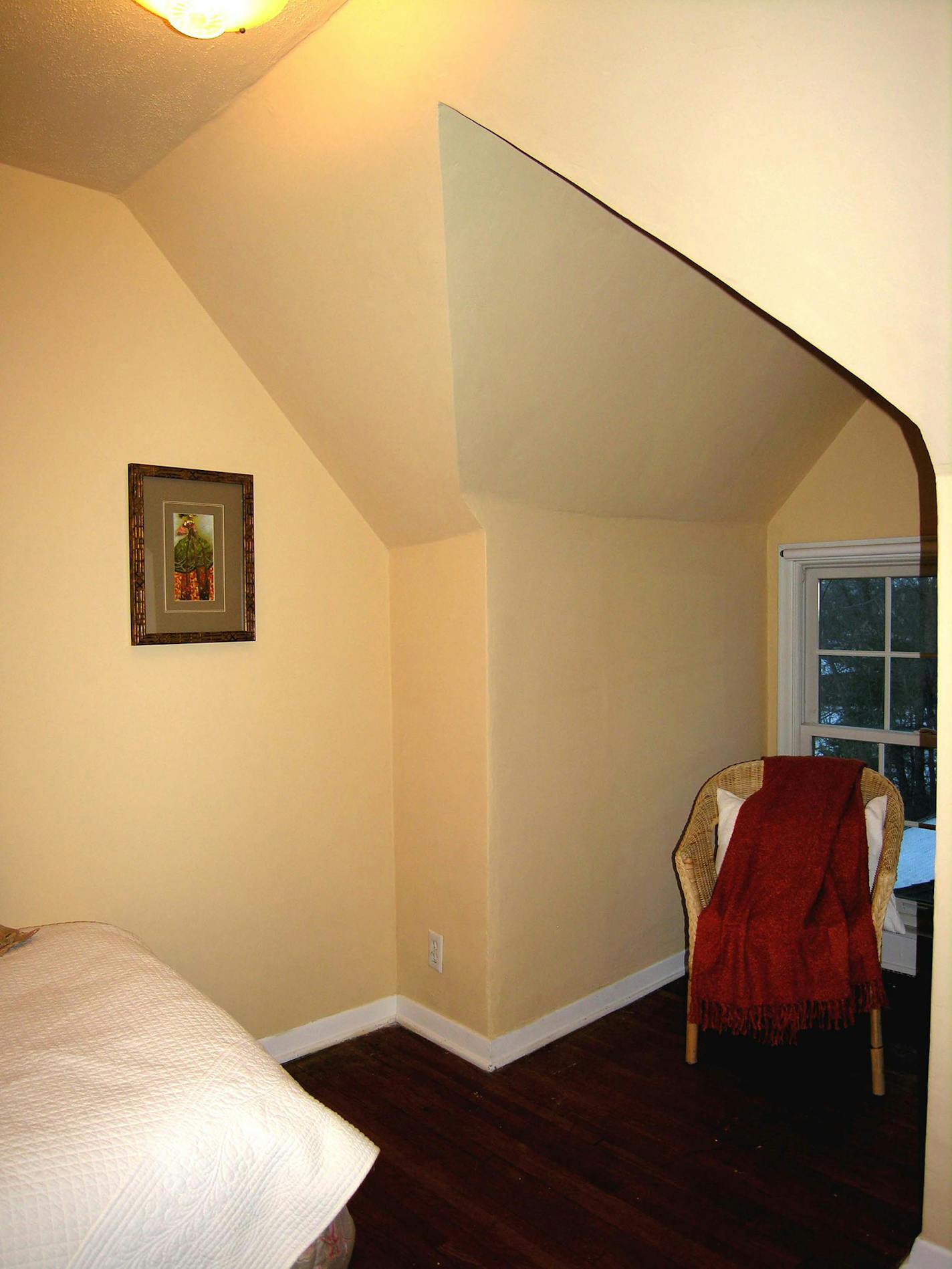 After: A small wicker chair in the window nook gives buyers a better of idea of how to use the space.