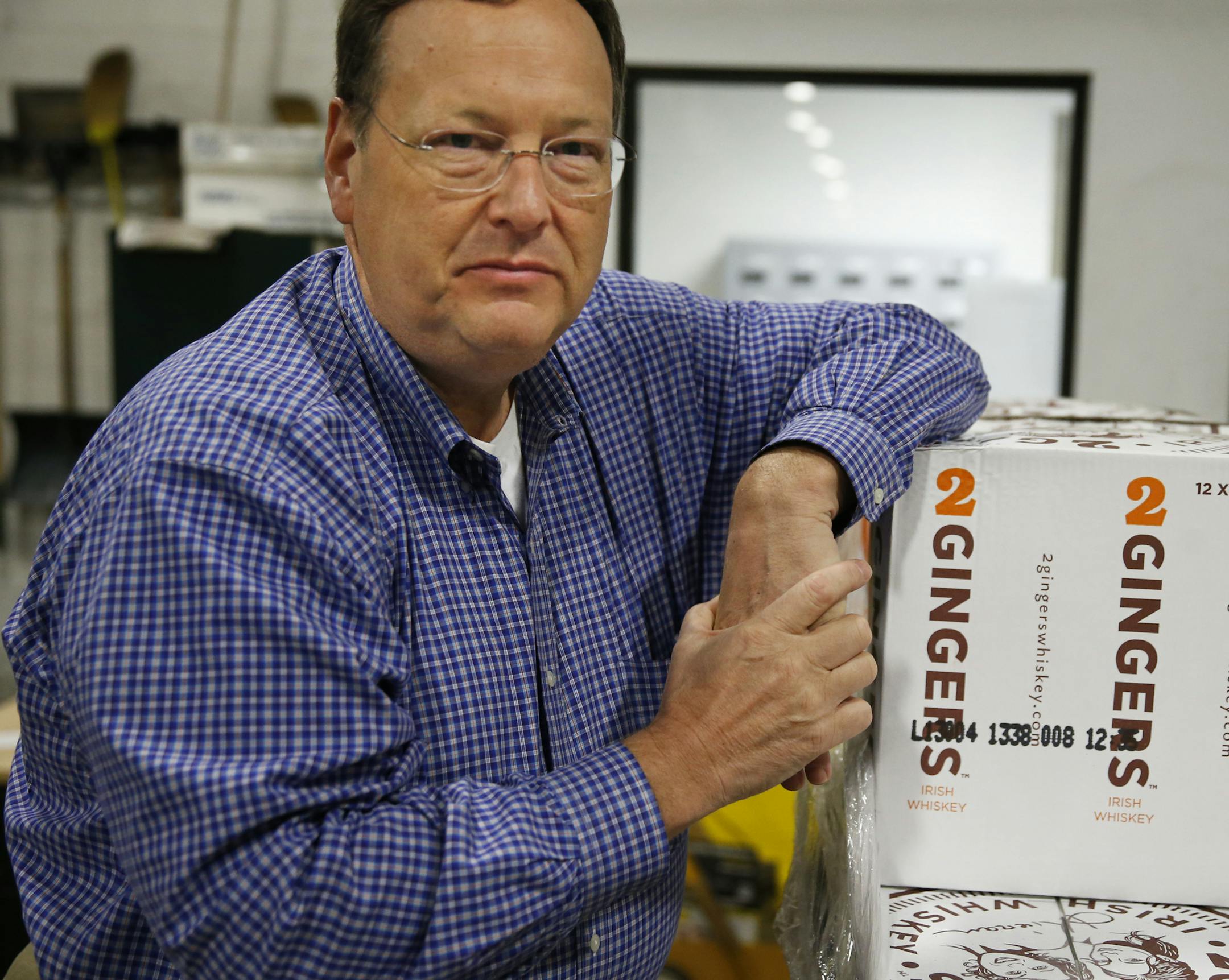 At the Murphy Co. warehouse in Minneapolis, President/CEO Richard T. Murphy Jr. pointed out some of the services his family business provides including packaging 2 Gingers whiskey with some glasses for a holiday gift pack.] richard tsong-taatarii@startribune.com