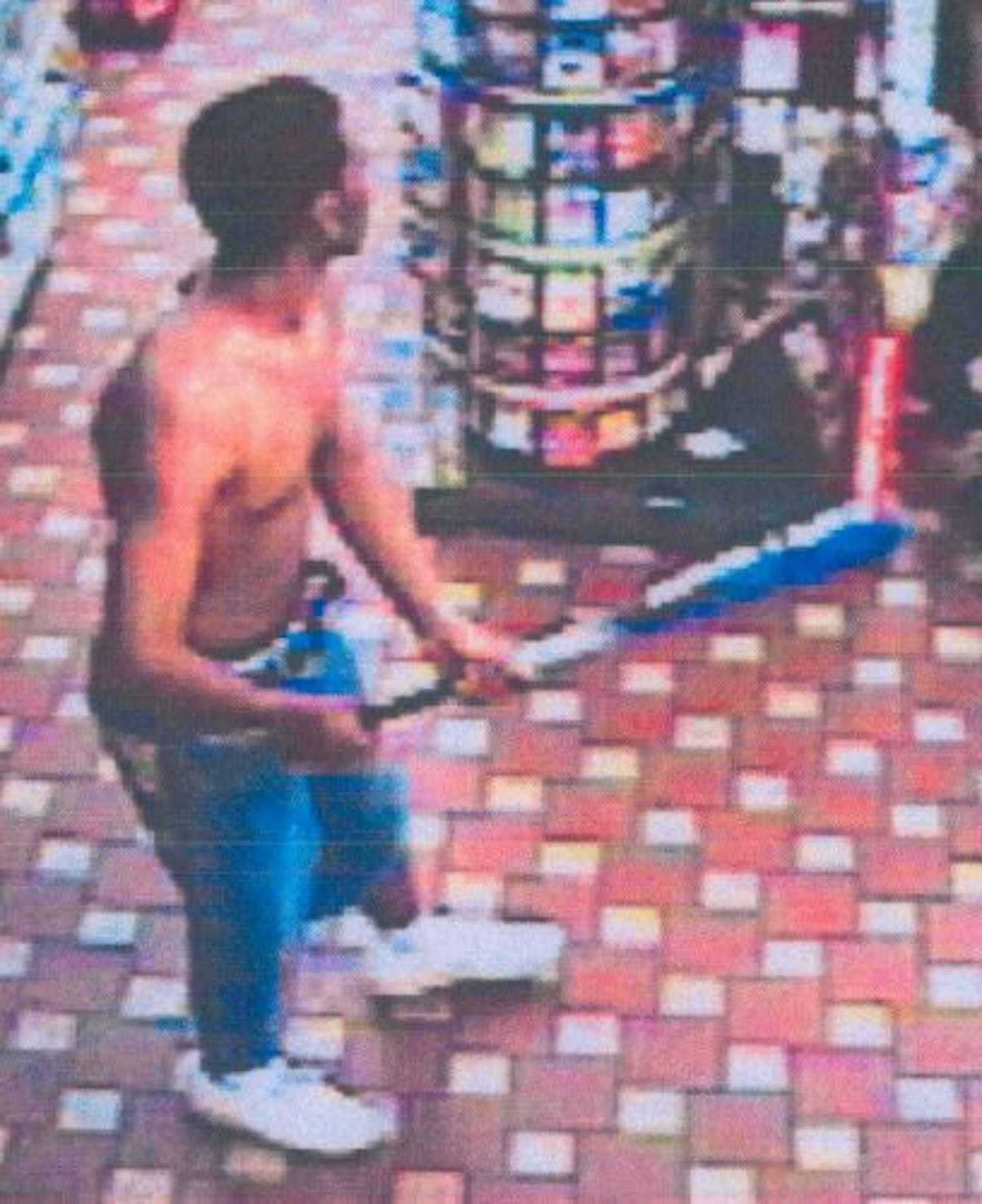 Photo via St. Paul Police -- Police released surveillance photos Thursday of people "of interest" in the case that left Edwin Daniel, 39, hospitalized for a week. He was beaten with metal baseball bats at a St. Paul gas station, a downtown SuperAmerica. The photographs were taken from SuperAmerica video footage May 25.