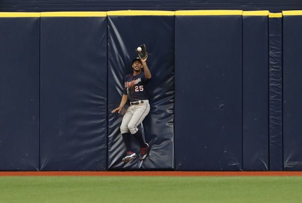 Byron Buxton makes another wall-crashing catch.