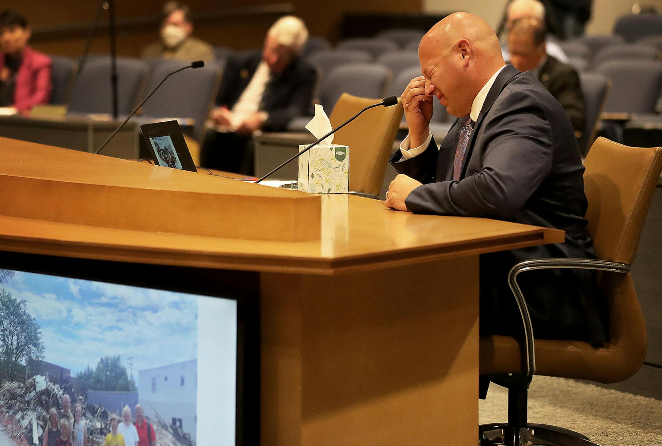 Minnesota Senate Republicans held the first in a series of hearings looking into damage to Twin Cities businesses in the wake of the unrest related to the killing of George Floyd in May at the Senate Building in St. Paul, Wednesday. Here, Jim Stage, owner of Lloyds Pharmacy in St. Paul, became emotional when talking about the fire.