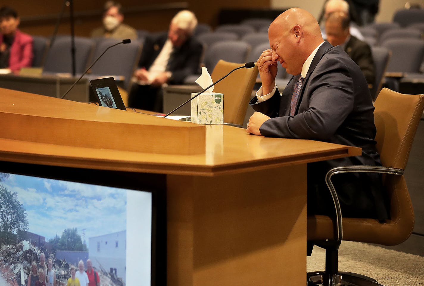 Minnesota Senate Republicans held the first in a series of hearings looking into damage to Twin Cities businesses in the wake of the unrest related to the killing of George Floyd in May at the Senate Building in St. Paul, Wednesday. Here, Jim Stage, owner of Lloyds Pharmacy in St. Paul, became emotional when talking about the fire.