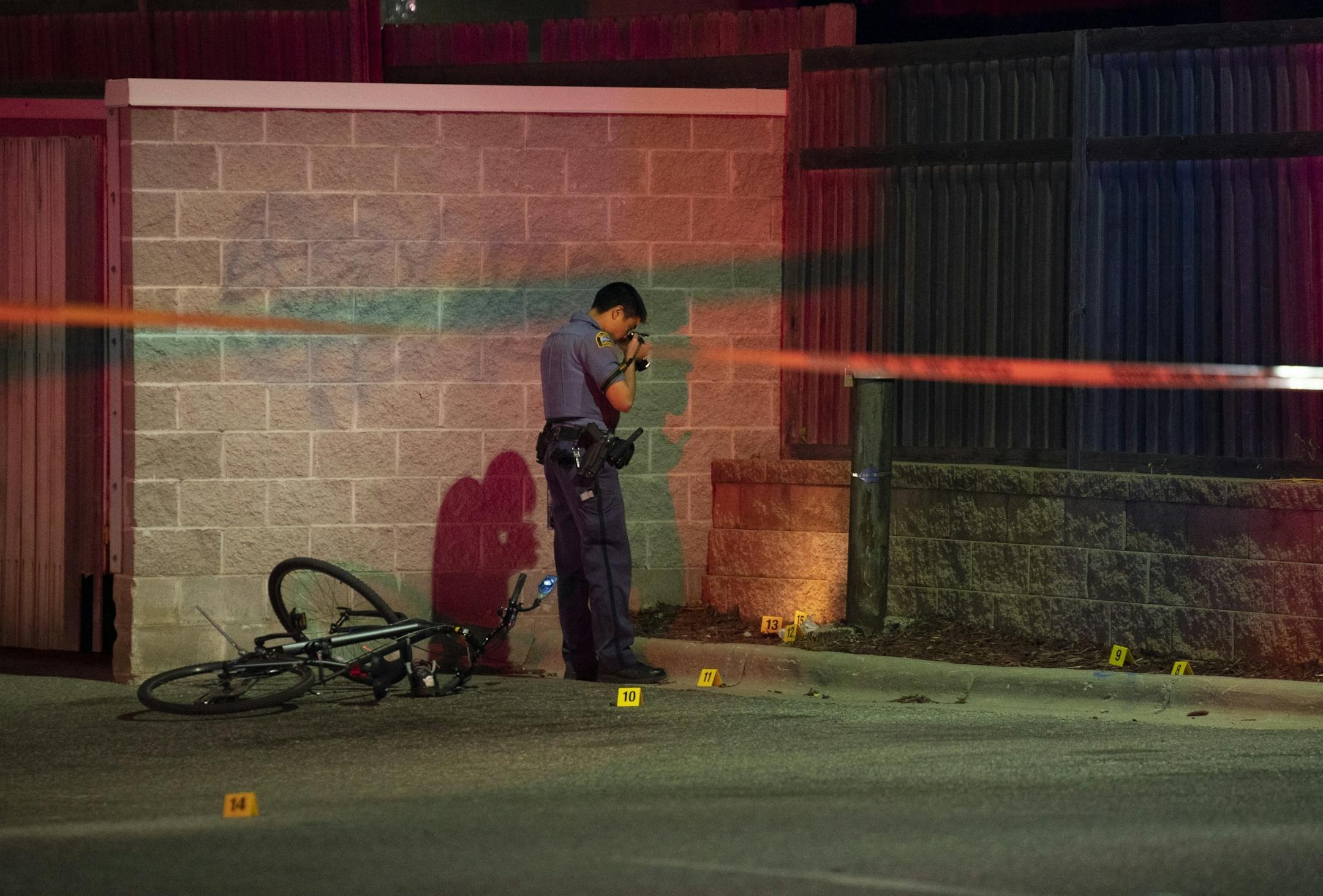A St. Paul Police officer investigated the scene of a double shooting off Pascal St. in St. Paul Sunday night.