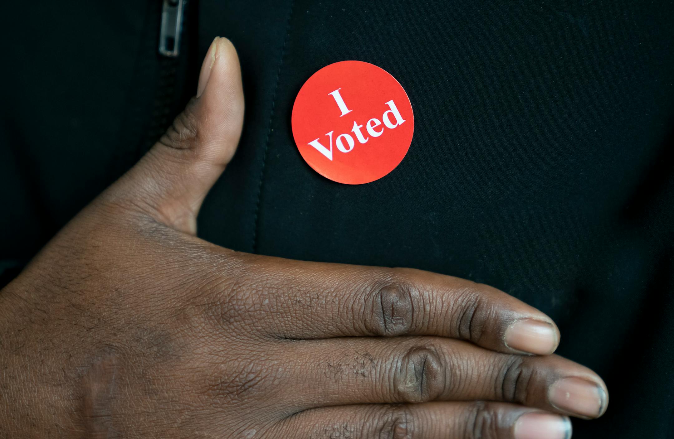 Victor Gaten put on an "I Voted" sticker after voting Wednesday at the Hennepin County Government Center. ] GLEN STUBBE • glen.stubbe@startribune.com Wednesday, October 21, 2020 Voting data analyzed by the Star Tribune finds voter turnout in the precincts with the highest concentration of Black voters dropped from 2012, when Barack Obama easily carried the state, to 2016, when Hillary Clinton nearly lost it. In a presidential election year that also saw a nationwide reckoning over race originate