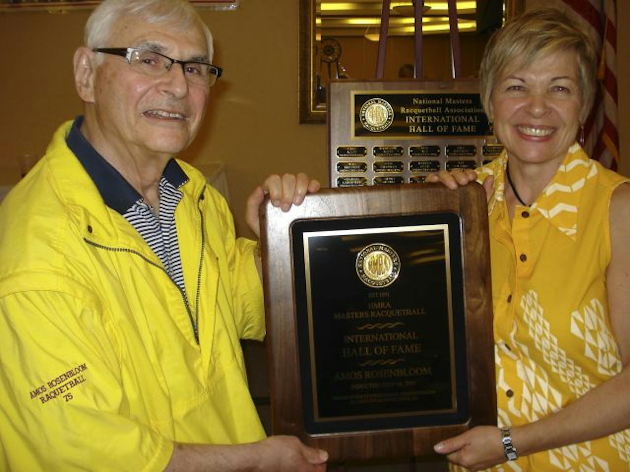 Amos Rosenbloom with his wife, Marsha McDonald, as he was inducted into the National Masters Racquetball Association Hall of Fame.