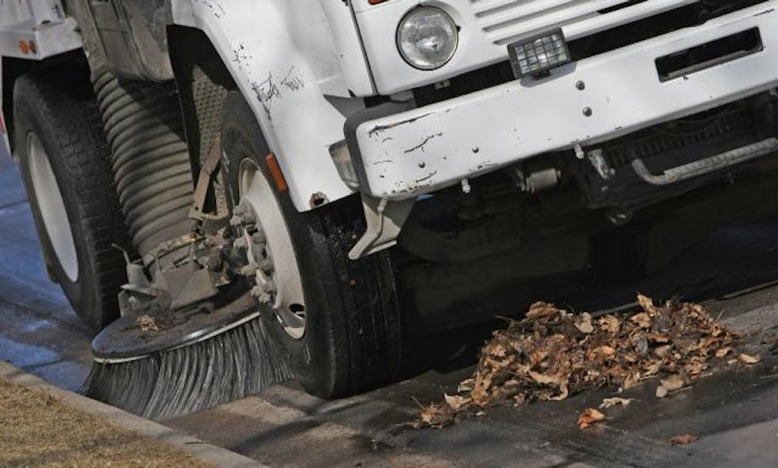 A crew from Carefree Services, which has a contract with the city of Plymouth to sweep streets, used an air sweeper to clean near the intersection of 21st Street and Fernbrook Lane.