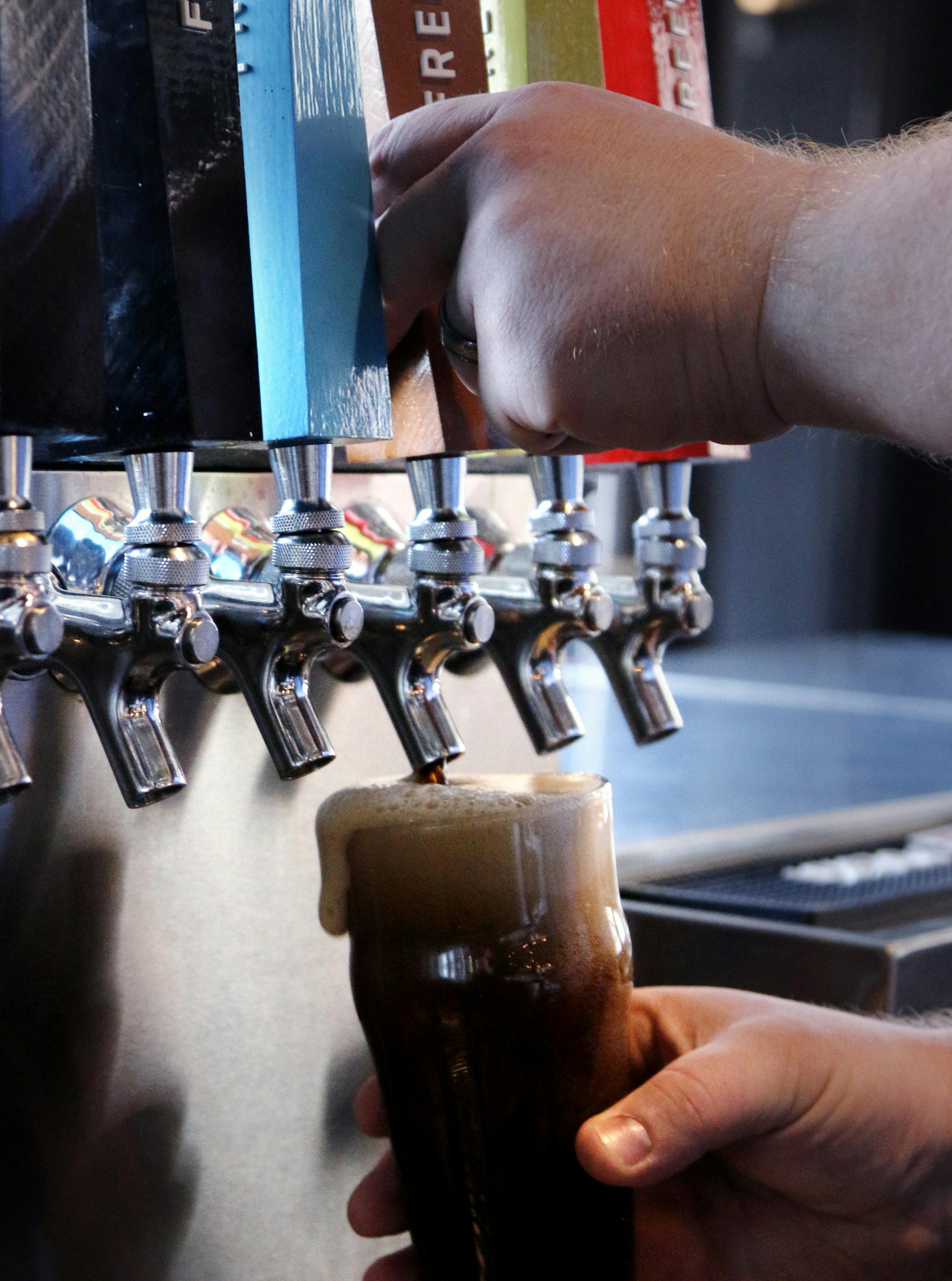 A bartender draws a Freehouse No. 3 BROWN from the tapper. It's a mahogany-colored ale, medium caramel sweetness, toasted malt character, mild hop bitterness balances malt profile, medium body - gravity: 13.0¬∞P / IBU: 21 / ABV: 5.2% ] Restaurant review: Freehouse, the North Loop brewpub by the Blue Plate Restaurant Co. BRIAN PETERSON ‚Ä¢ brian.peterson@startribune.com Minneapolis, MN 3/28/2014