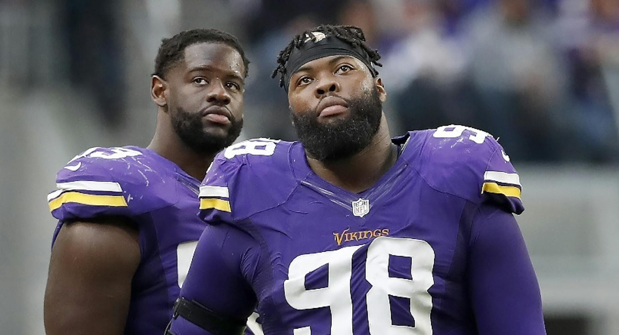 Vikings defensive linemen Shamar Stephen (93) and Linval Joseph (98) watched a replay of a Sam Bradford interception to see if they had to take the field against the Colts on Sunday. The interception was overturned because of a roughing the passer penalty.