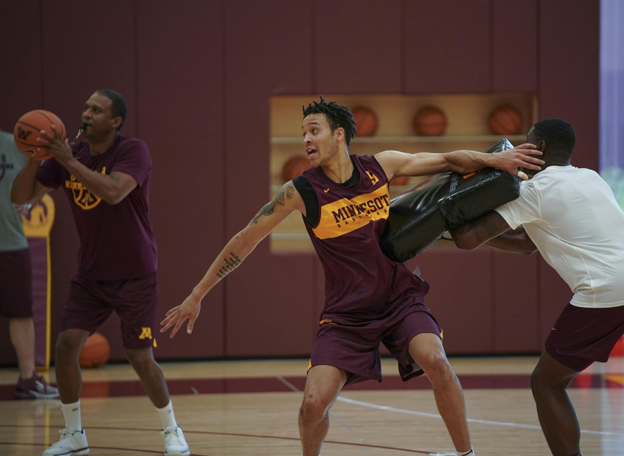 Guard Amir Coffey, coming off an injury from last year, took part in a drill during practice Tuesday afternoon.