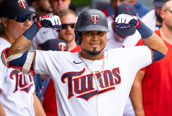 Minnesota Twins first baseman Luis Arraez (2) celebrates in the dugout after hitting a solo home run in the first inning.