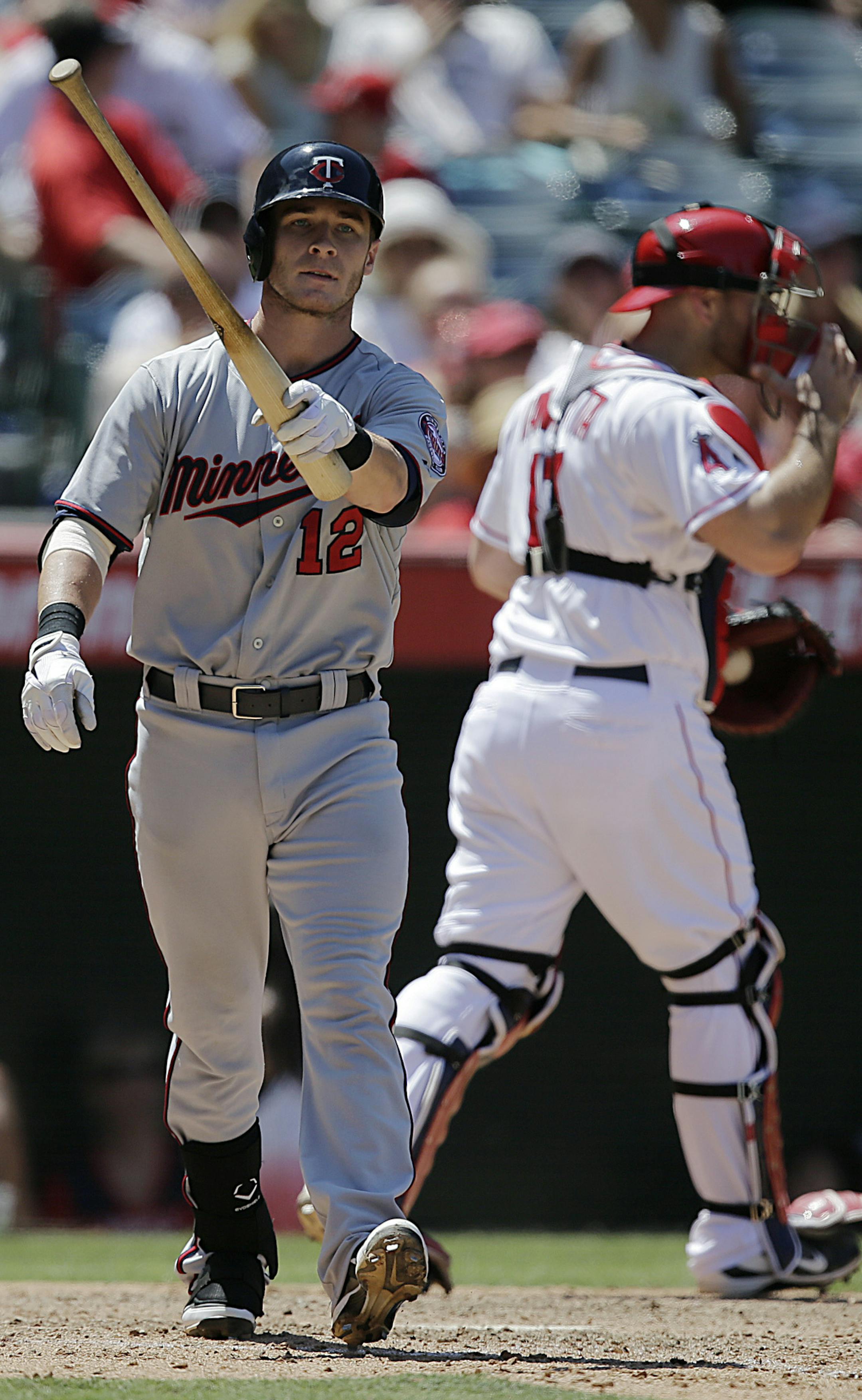 Minnesota Twins' Chris Herrmann reacts after striking out during the seventh inning of a baseball game against the Los Angeles Angels on Wednesday, July 24, 2013, in Anaheim, Calif. (AP Photo/Jae C. Hong)