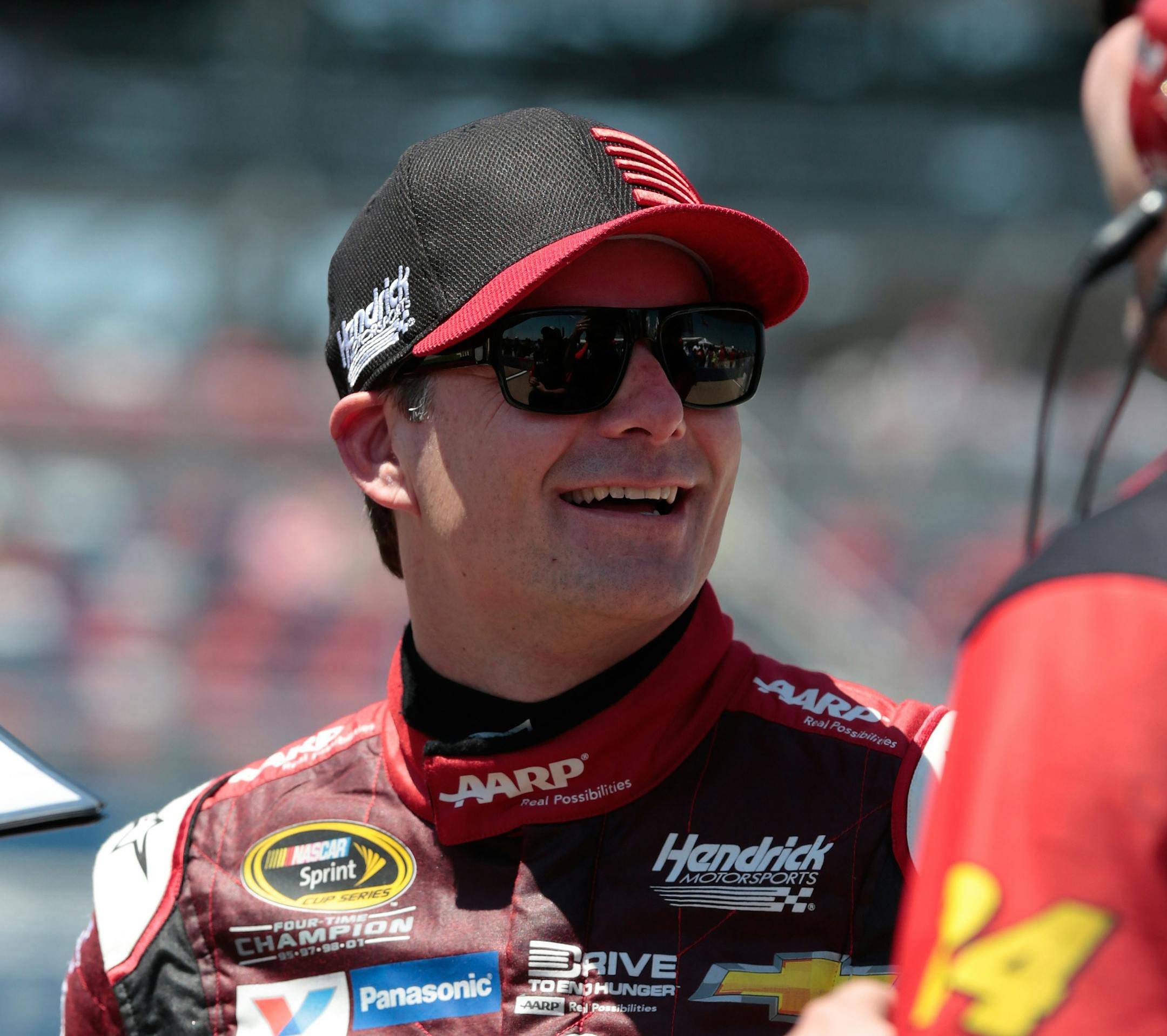 Driver Jeff Gordon smiles during qualifying for the NASCAR Sprint Cup Series auto race at Talladega Superspeedway, Saturday, May 2, 2015, in Talladega, Ala. Gordon, who is in his last season, qualified first for the pole. (AP Photo/Butch Dill)