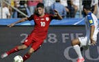 FILE - In this Sept. 5, 2017, file photo, United States' Christian Pulisic controls the ball during a 2018 World Cup qualifying soccer match against H