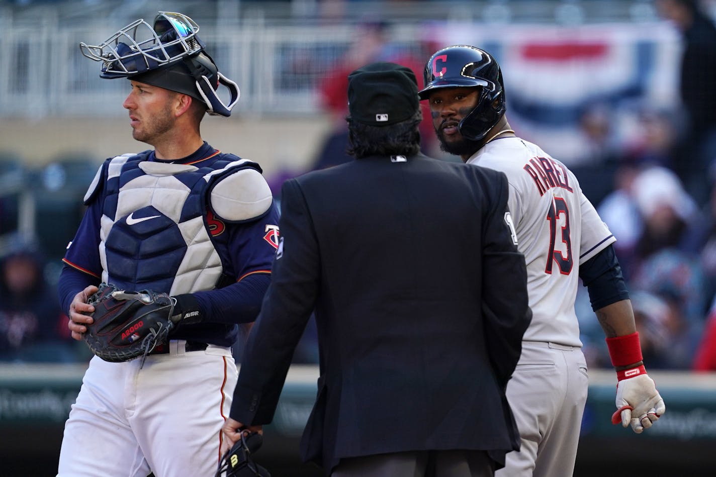 Cleveland shortstop Hanley Ramirez looked back at the umpire Saturday at Target Field.