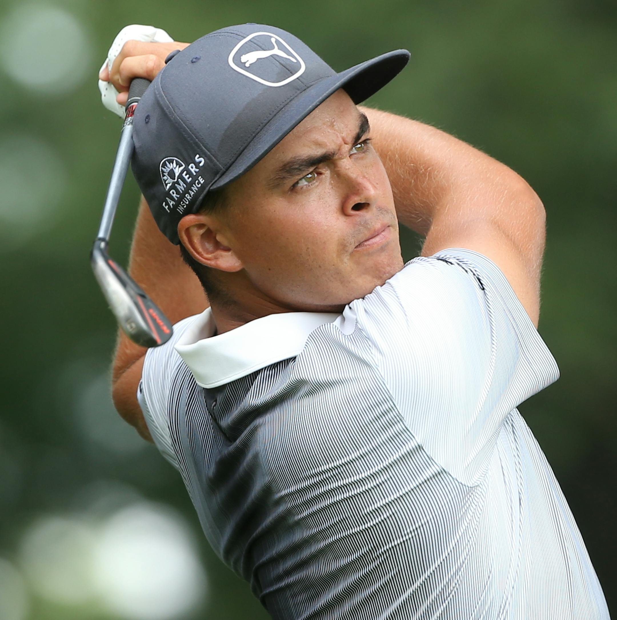 Ricky Fowler watches his tee shot on the ninth hole during the second round of the PGA Championship golf tournament at Baltusrol Golf Club in Springfield, N.J., Friday, July 29, 2016. (AP Photo/Seth Wenig) ORG XMIT: PGA1