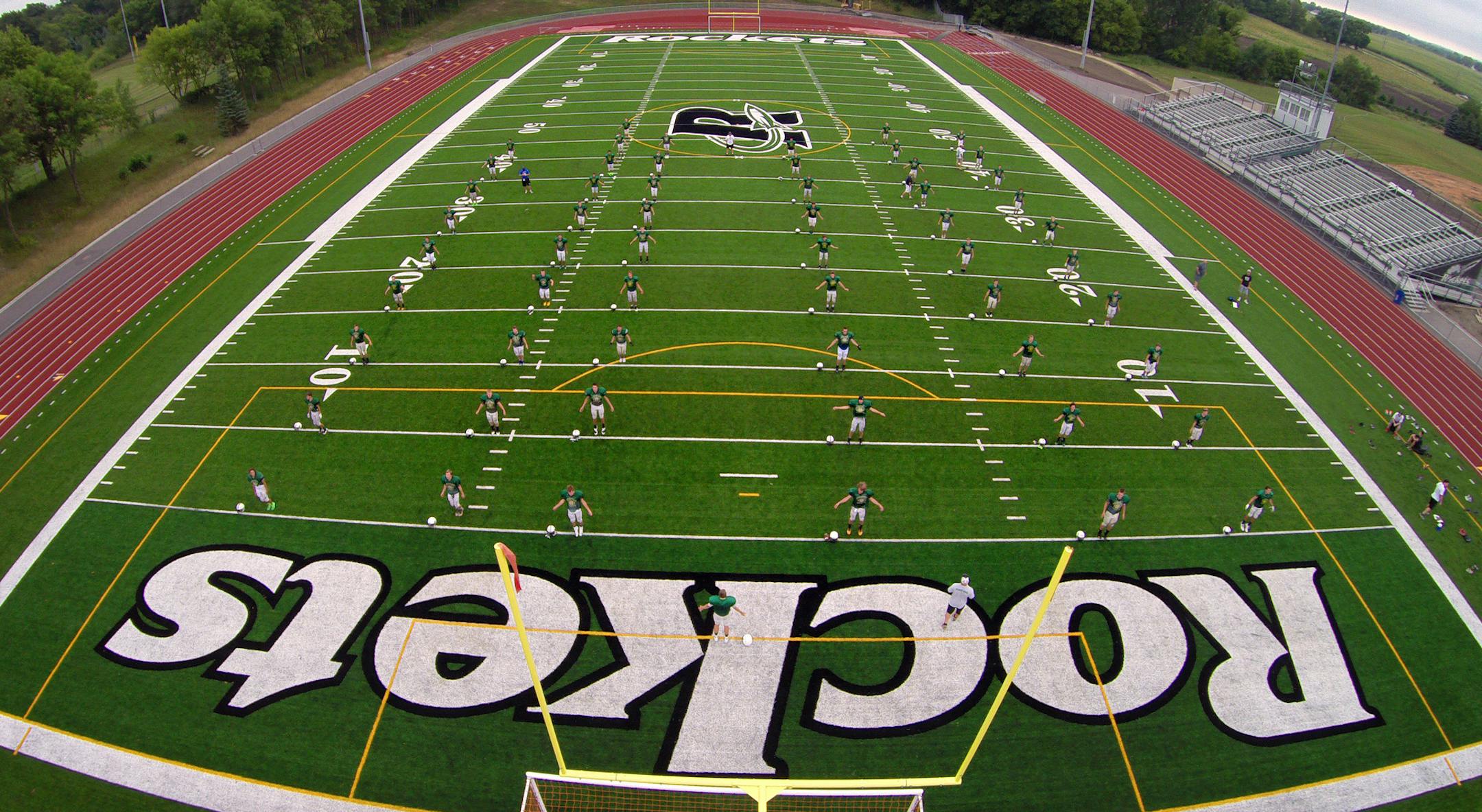 The Rockford Rockets, photographed by Brian Peterson, worked out on their turf field, the result of a vote in 2012 that gave the school big-city facilities amid its country atmosphere.