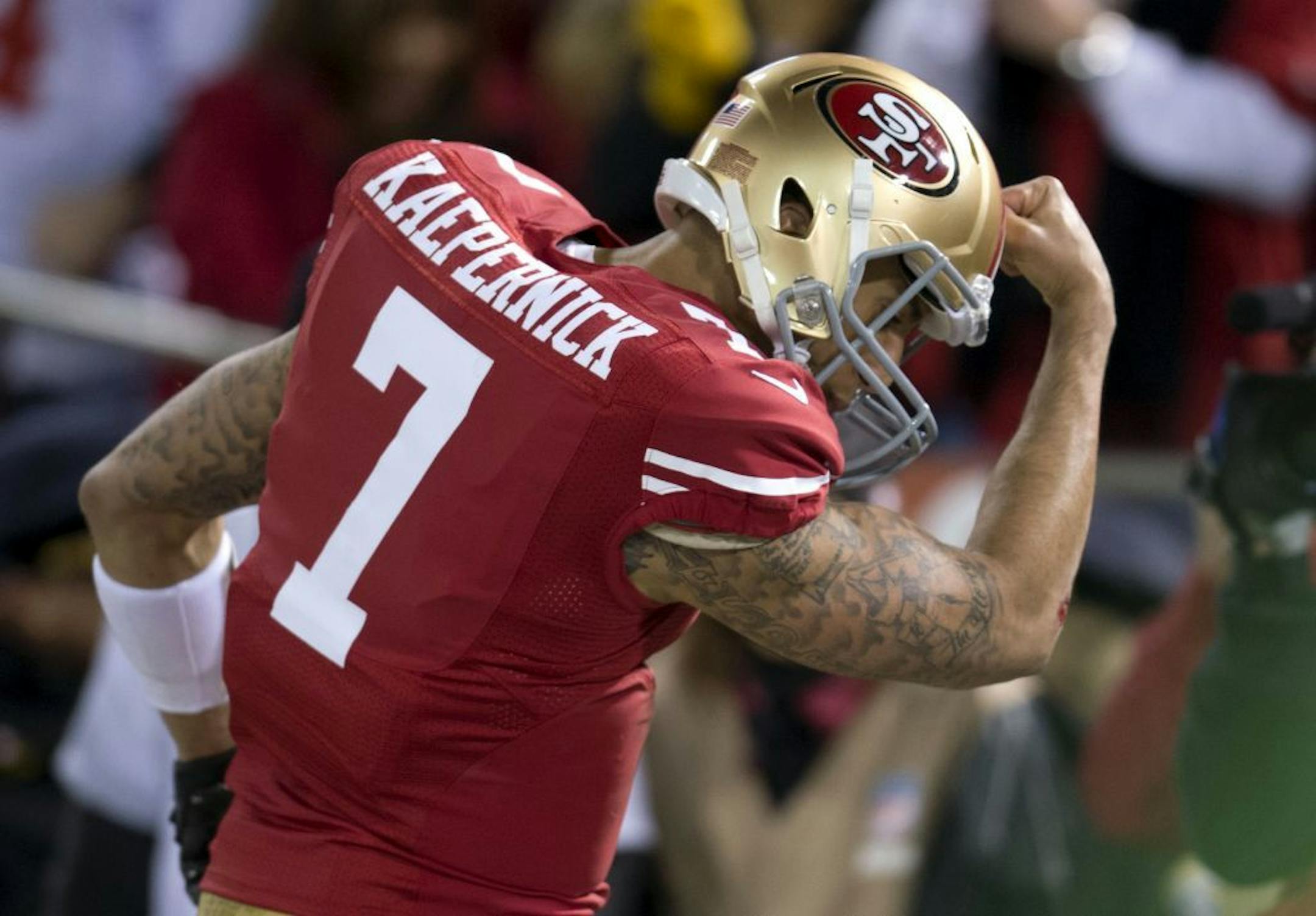 San Francisco 49ers quarterback Colin Kaepernick celebrates a touchdown against Green Bay.