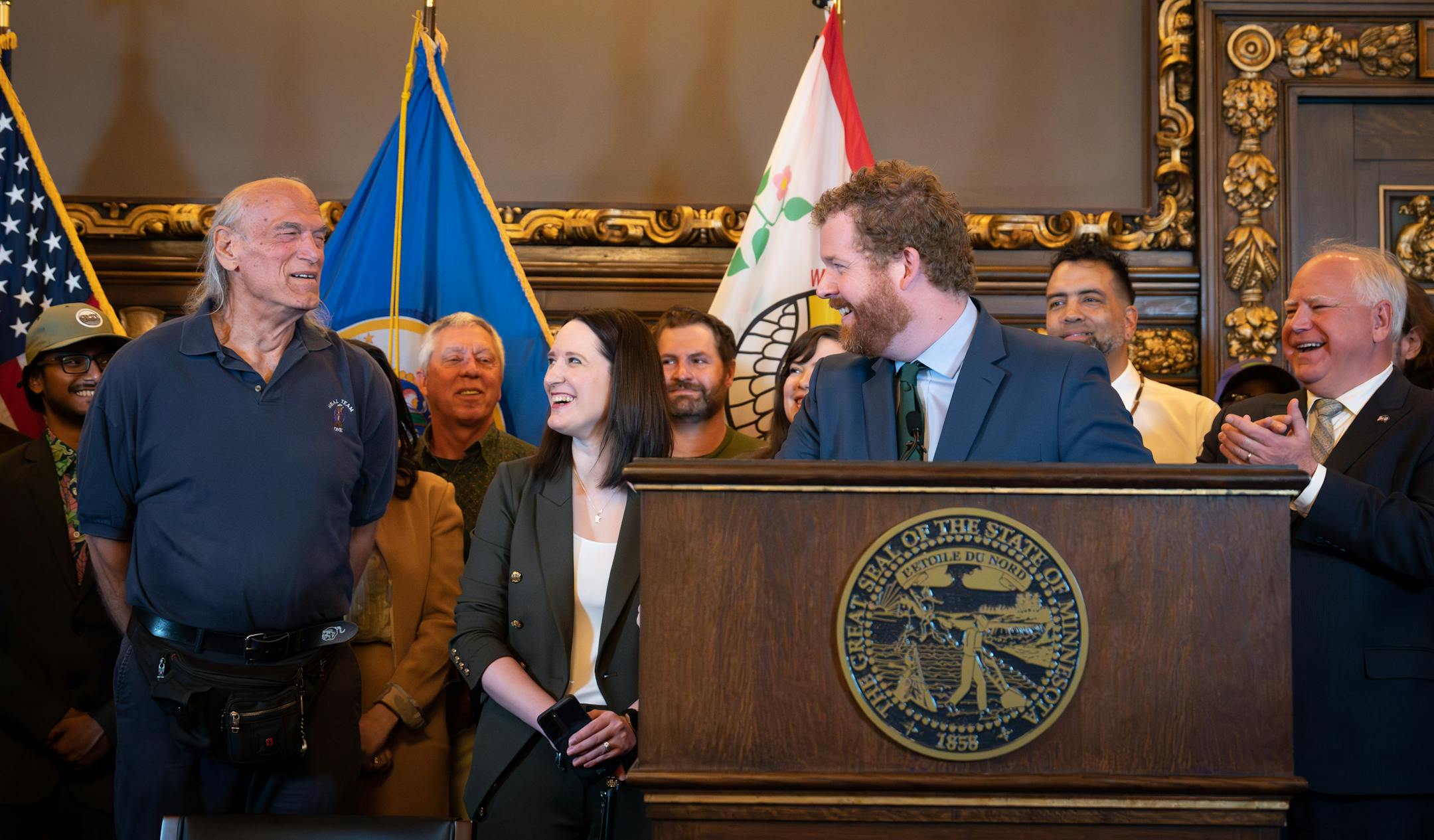 Former Governor Jesse Ventura was on hand as Gov. Tim Walz legalized marijuana in Minnesota with the stroke of a pen on Tuesday. Between them are the bill sponsors Sen. Lindsey Port, DFL-Burnsville and Rep. Zack Stephenson, DFL-Coon Rapids Tuesday, May 30, 2023 St. Paul, Minn. ] GLEN STUBBE • glen.stubbe@startribune.com