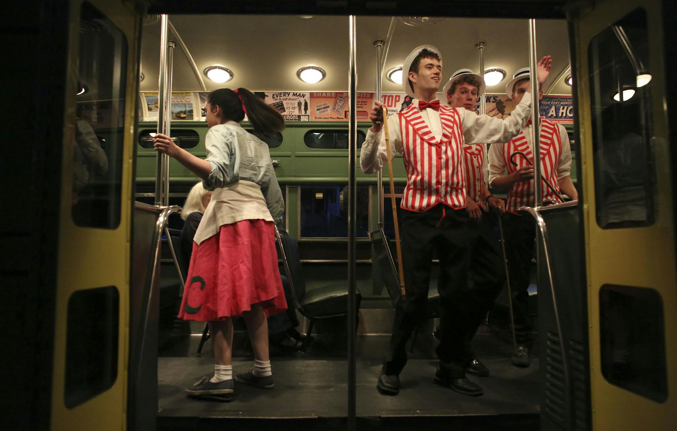 Students and graduates of Southwest High School, for the Minnesota Streetcar Museum, had a dress rehearsal for a Murder Mystery on the Como Lake Harriet Trolley in Minneapolis Min., Wednesday, July 24, 2013. ] (KYNDELL HARKNESS/STAR TRIBUNE) kyndell.harkness@startribune.com