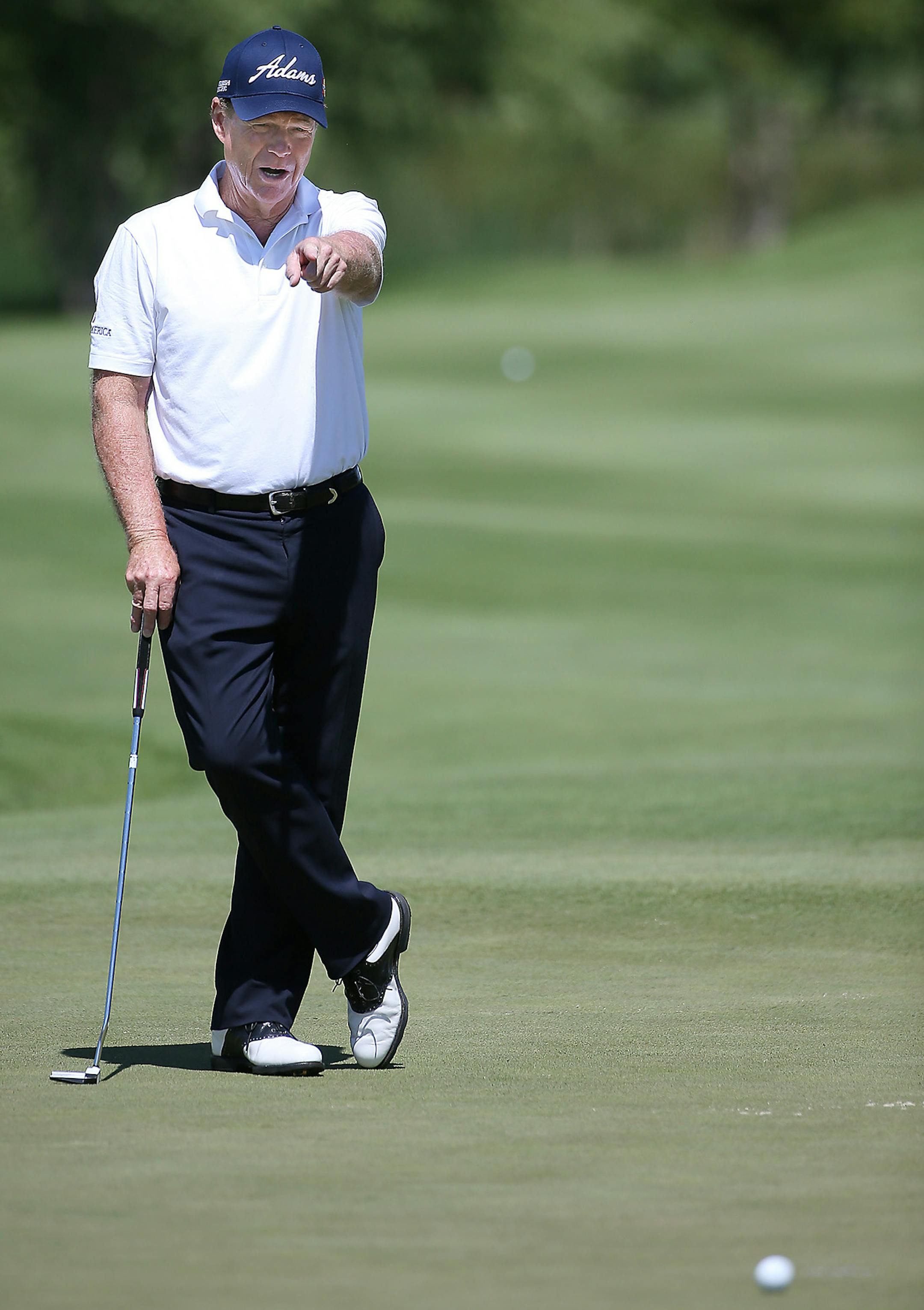 Tom Watson provided some pointers to golfers he was playing with on No. 10 during a pro-am at TPC Twin Cities on Thursday.