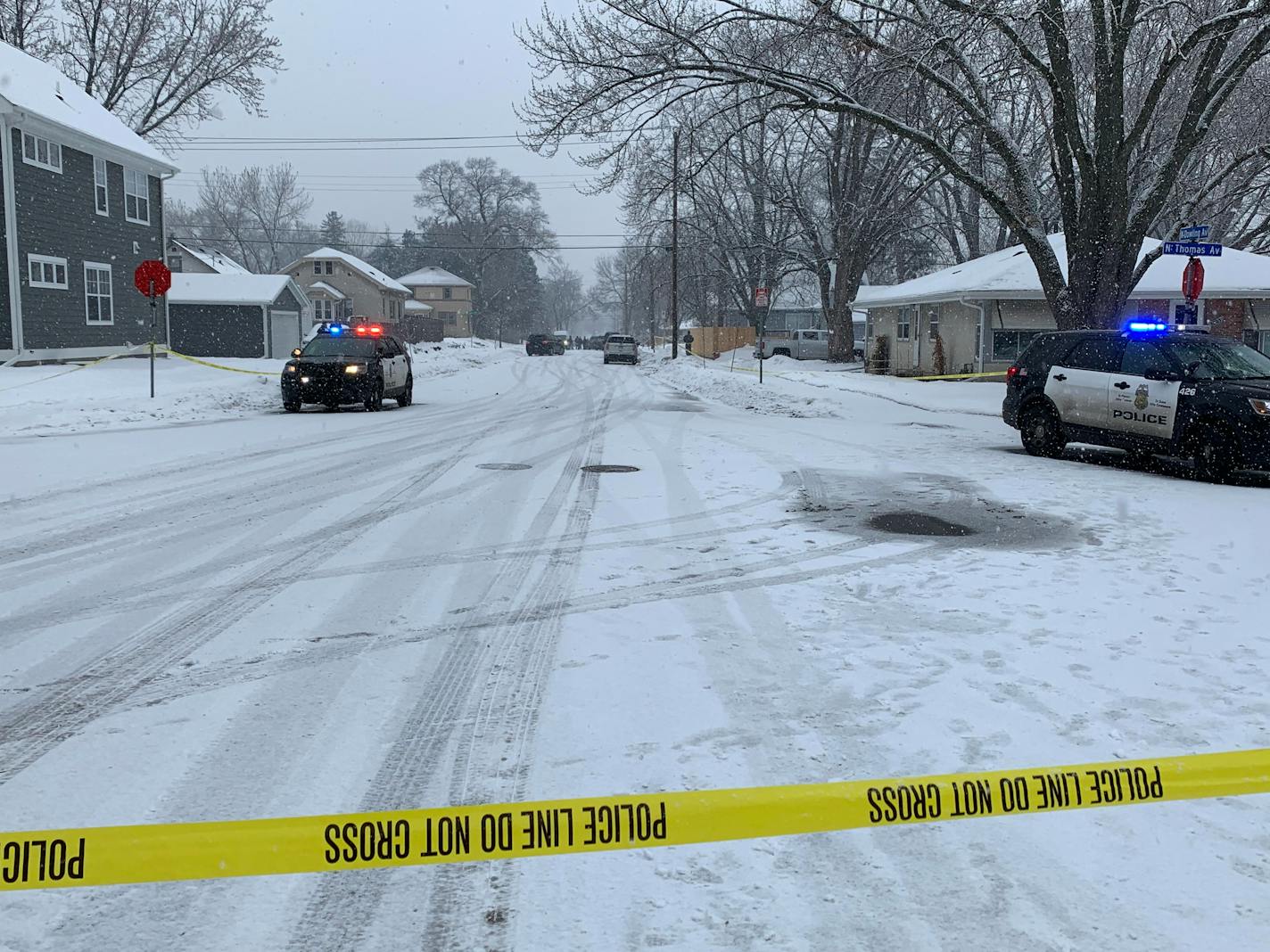 The perimeter of a shooting scene where officers exchanged gunfire with a suspect who was shot and hospitalized. He is expected to survive.