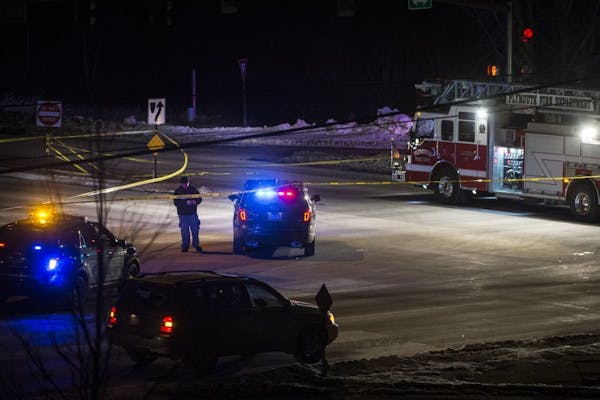 Police and the Plymouth Fire Department blocked off the intersection of Northwest Blvd. and Rockford Road in Plymouth near the site of a body.
