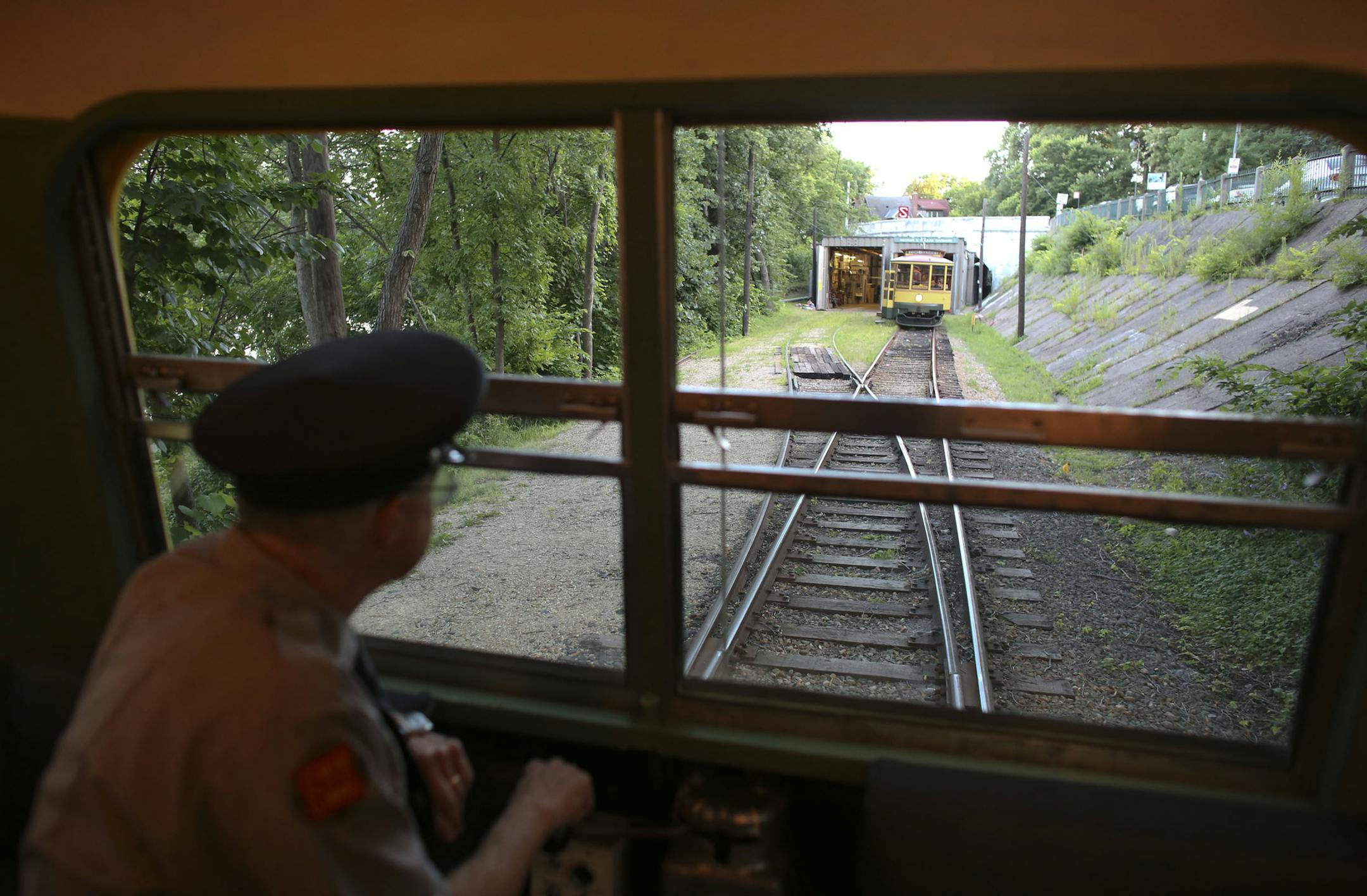 Russ Isbrandt, motor man for the Como Lake Harriet Trolley drove the car backwards in Minneapolis Min., Wednesday, July 24, 2013. ] (KYNDELL HARKNESS/STAR TRIBUNE) kyndell.harkness@startribune.com Russ Isbrandt, motor man for the Como Lake Harriet Trolley drove the car backwards toward the end of the line in Minneapolis Min., Wednesday, July 24, 2013. ] (KYNDELL HARKNESS/STAR TRIBUNE) kyndell.harkness@startribune.com