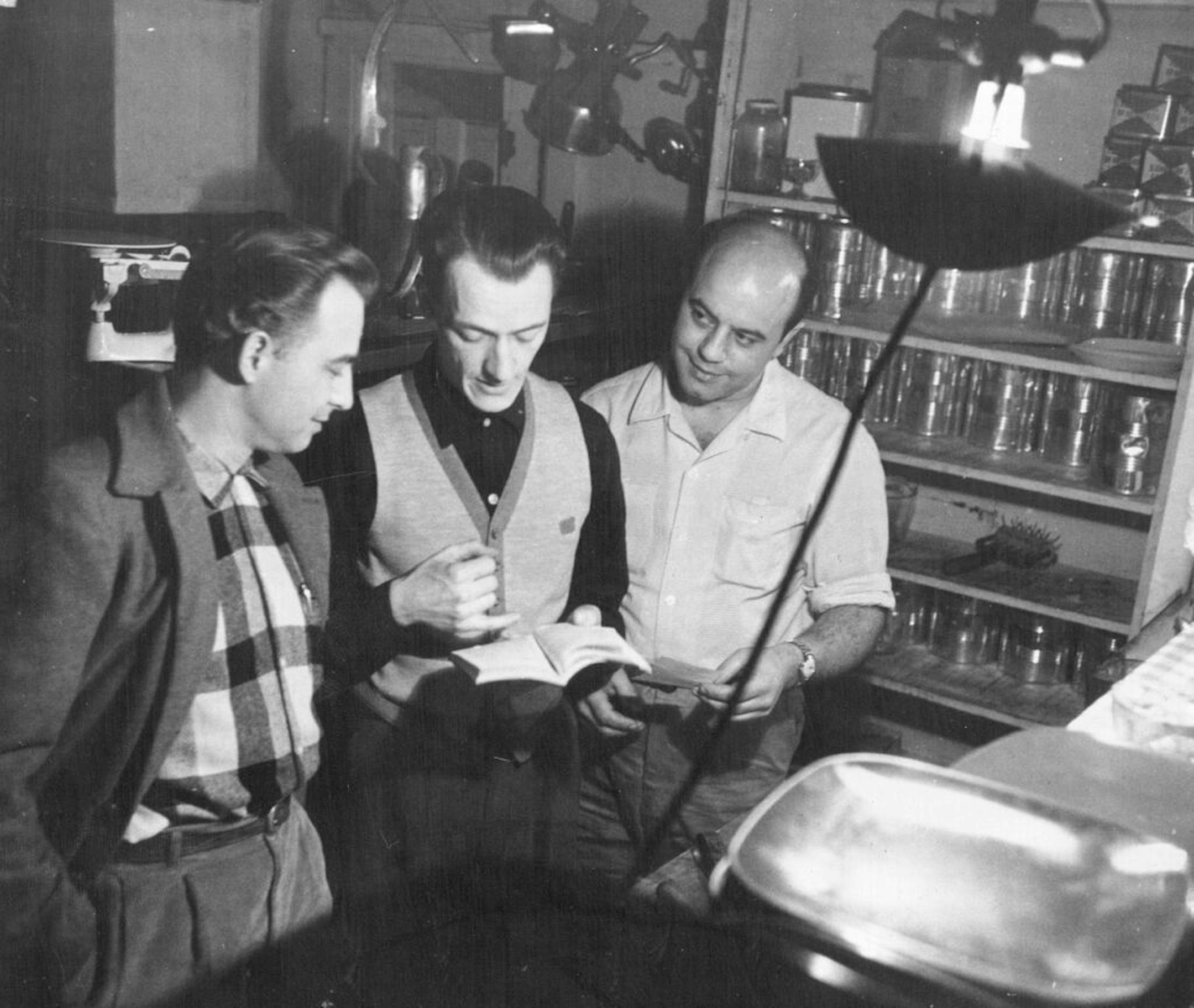 January 1958: Jim Hiner, Dudley Riggs and Tony Mastrey at a" shocking-pink hole in the wall on the edge of Seven Corners called Stefano's. It's dim, a bit dusty but a likely place for pizza and coffee."