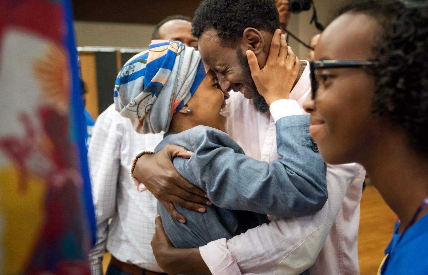 Rep. Ilhan Omar hugged her husband Ahmed Hirsi after she won the DFL endorsement. Their daughter Isra Hirsi, 15, is on the right. ] GLEN STUBBE &#xef; glen.stubbe@startribune.com Sunday, June 17, 2018 At 12p.m., a special DFL endorsement convention to (in theory) pick an endorsed candidate for the Fifth Congressional District -- the seat currently held by U.S. Rep. Keith Ellison. The field of candidates includes state Rep. Ilhan Omar, former state House Speaker Margaret Anderson Kelliher and sta