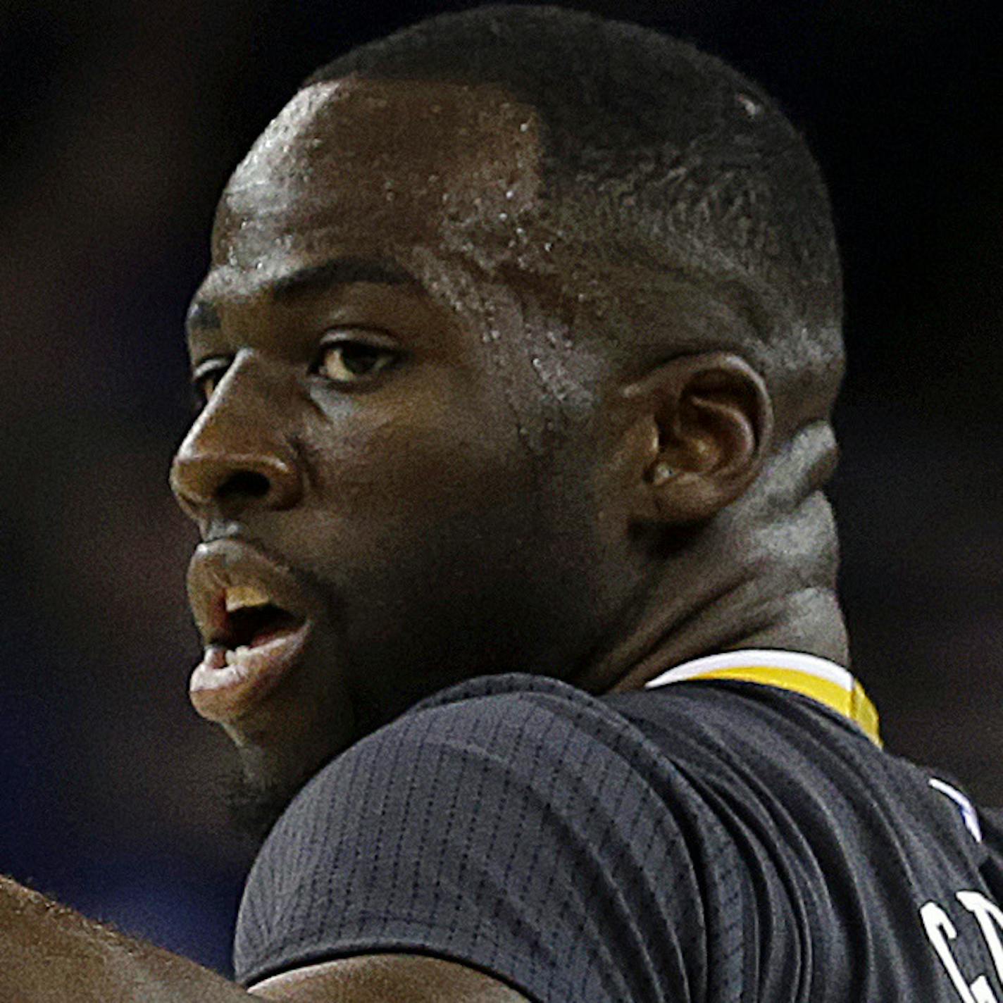 Golden State Warriors' Draymond Green gestures after scoring against the Phoenix Suns during the first half of an NBA basketball game Saturday, March 12, 2016, in Oakland, Calif. (AP Photo/Ben Margot)