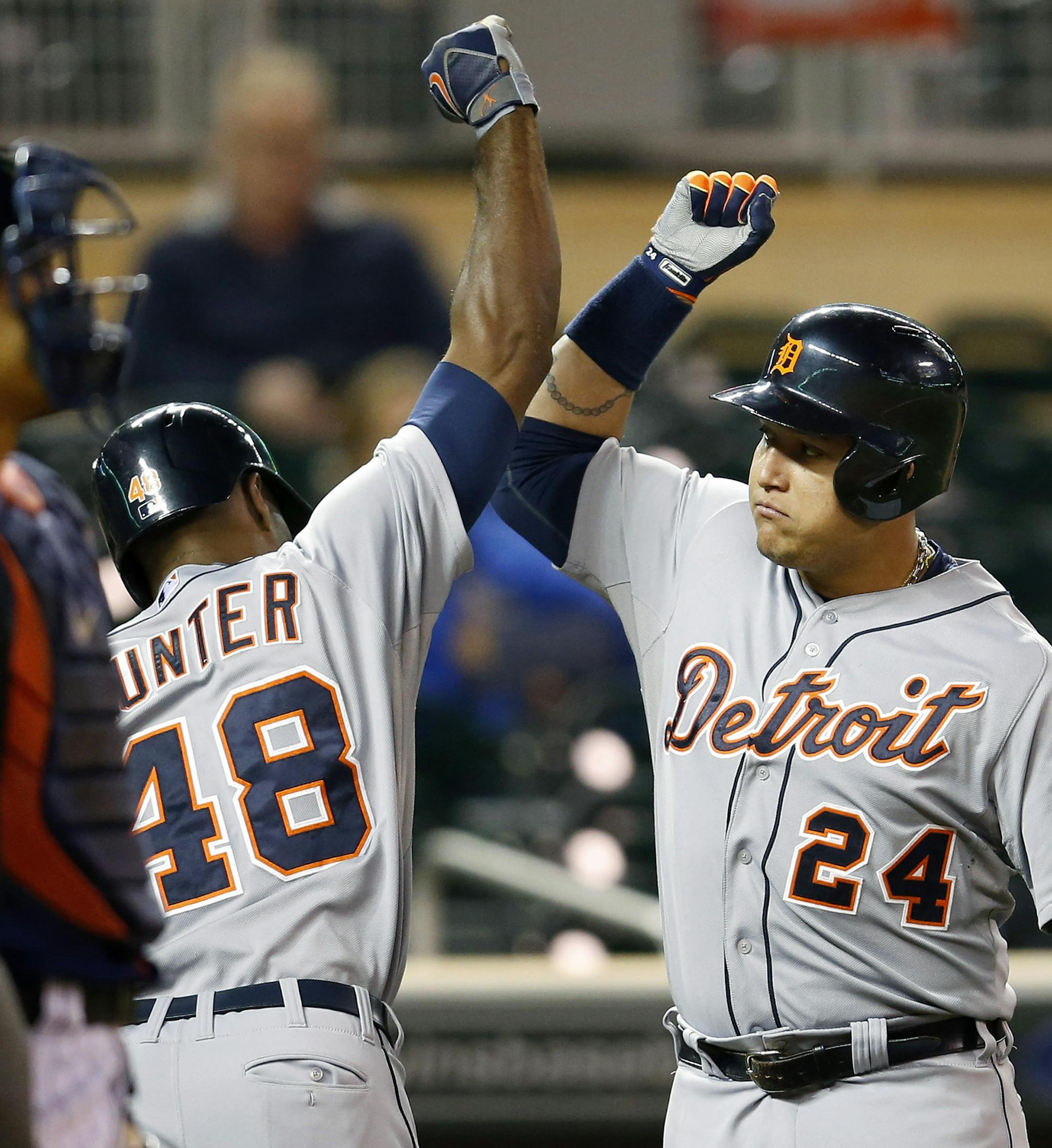 Miguel Cabrera congratulated Torii Hunter after hitting a home run in the ninth inning to break a tie. Detroit beat Minnesota by a final score 8-6. Cabrera also hit a home run during hi sat bat. ] CARLOS GONZALEZ cgonzalez@startribune.com - September 15 , 2014 , Minneapolis, Minn., Target Field, MLB, Minnesota Twins vs. Detroit Tigers