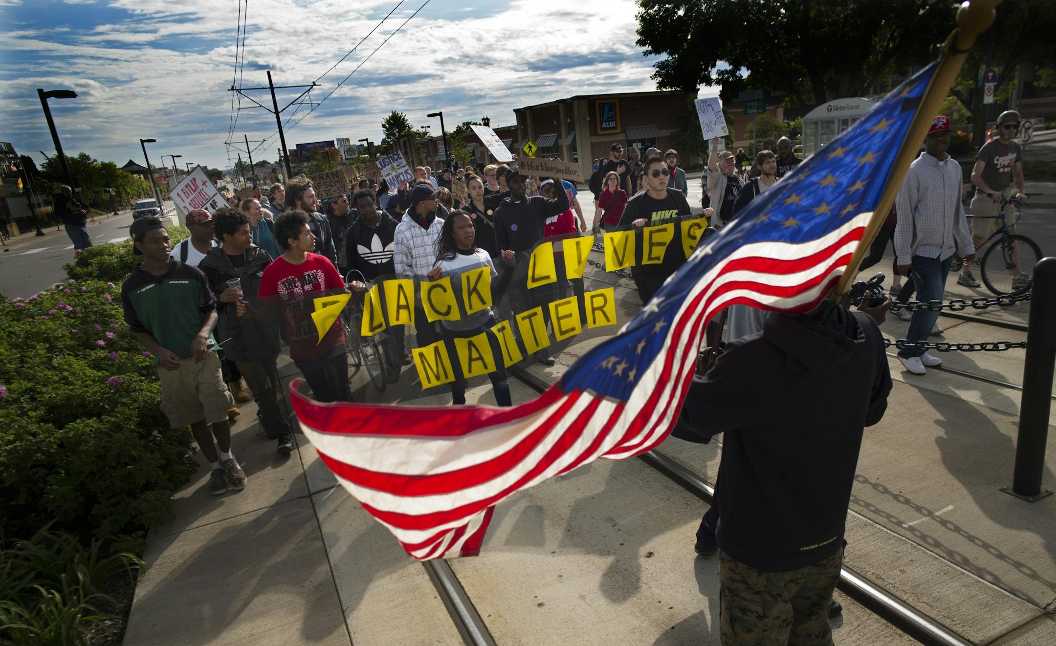 Near the Lexington light rail station in St. Paul, protesters with Black Lives Matters blocked traffic to and from TCF Stadium on the home opener for the Vikings. A counter-protester tried to block the march on the light rail tracks.
